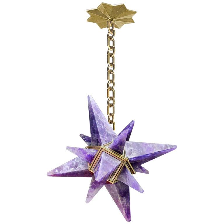 Pair of star forms amethyst quartz chandelier with polish brass frame. Created by Phoenix Gallery, NYC.
One socket installed. Use one 75 watts LED candelabra light.
Light bulb supplied.
The chandelier is 14