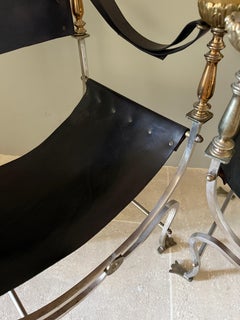 Pair of steel and brass french armchairs attributed to Maison Jansen