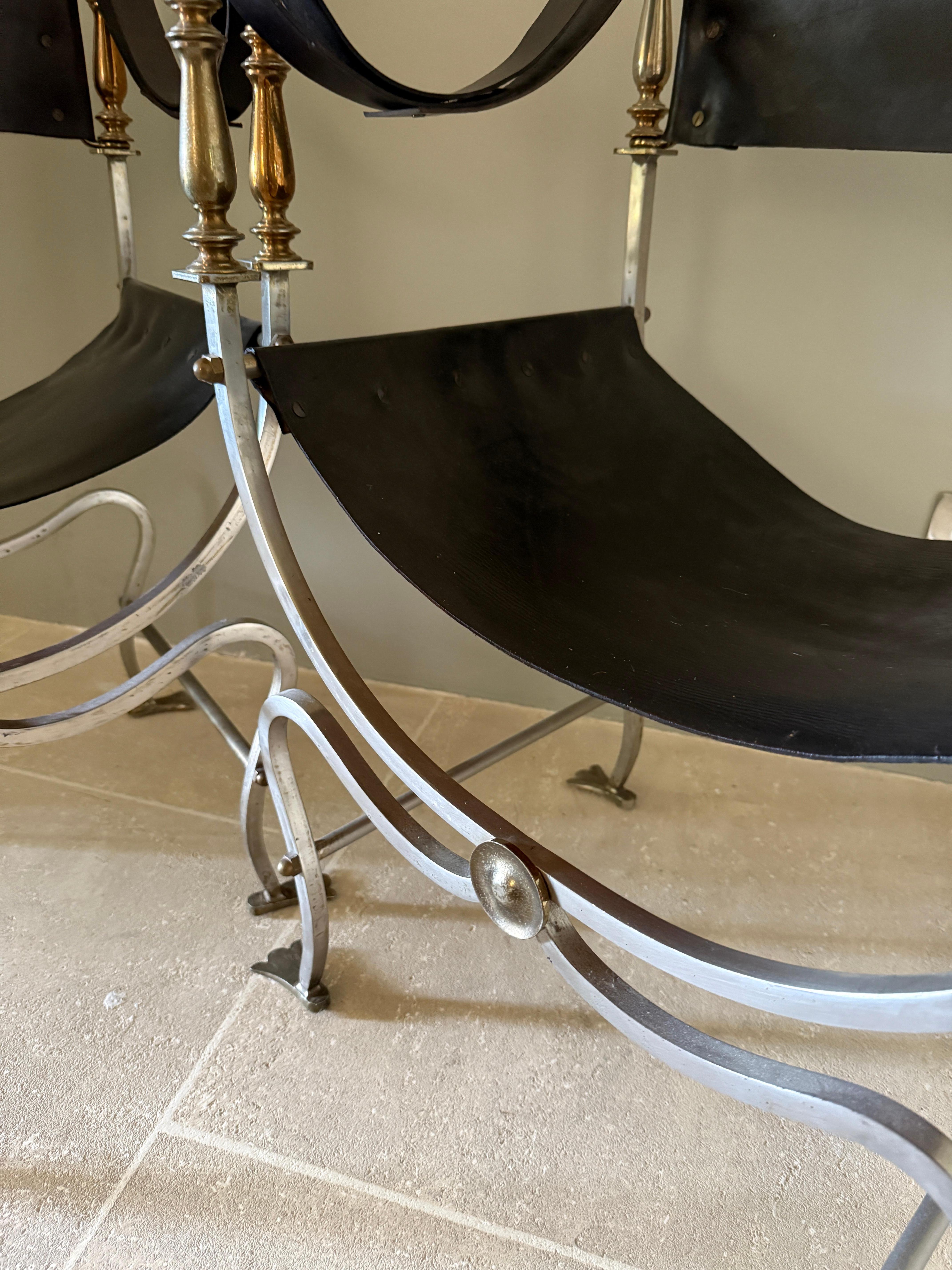 French Pair of steel and brass french armchairs attributed to Maison Jansen For Sale
