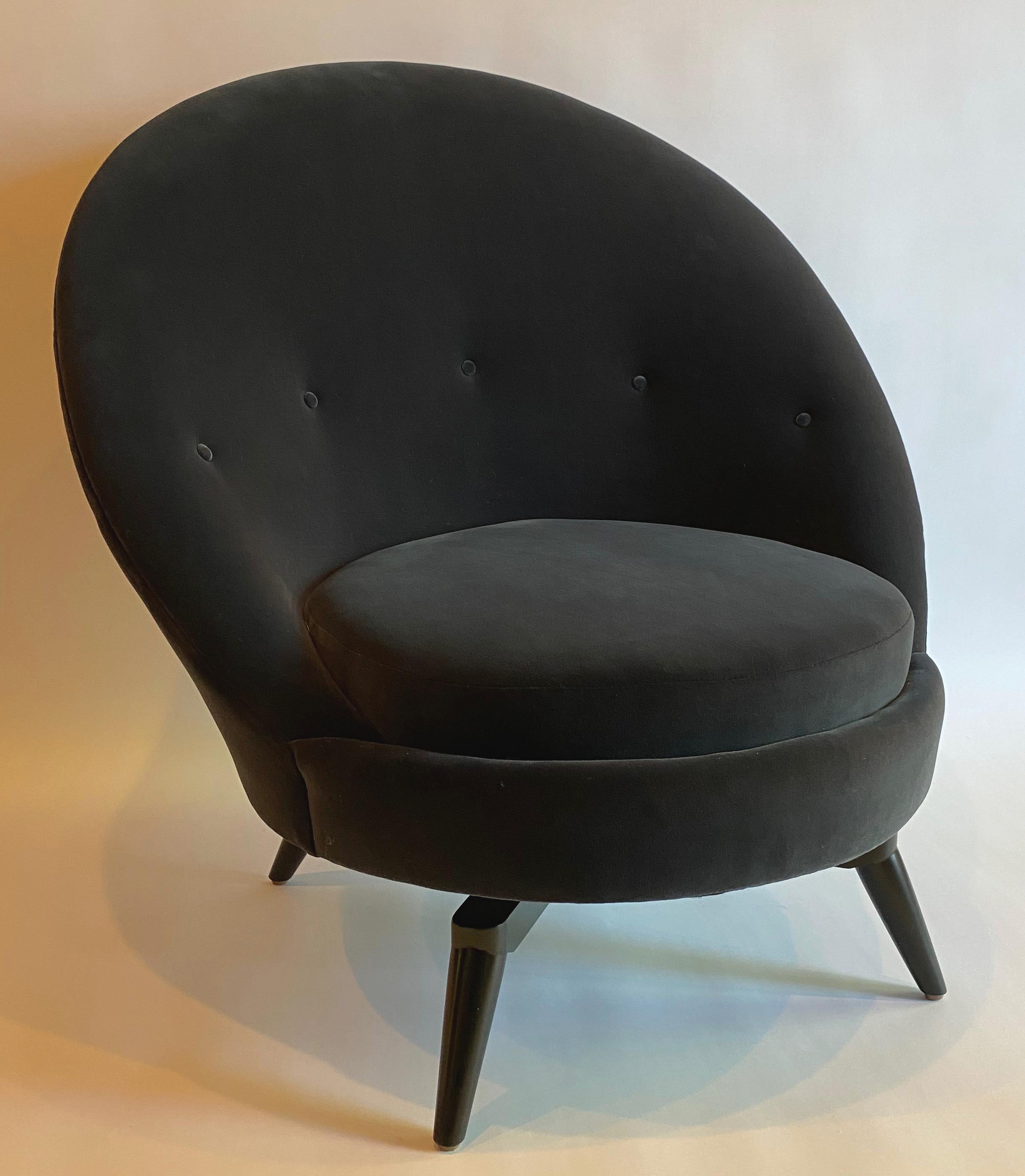 Swivel egg chair in the French midcentury style. This sophisticated chair is upholstered in heavy-weight burnt steel grey velvet. This super stylish and versatile example is as comfortable as it looks and is painstakingly patterned with a hardwood