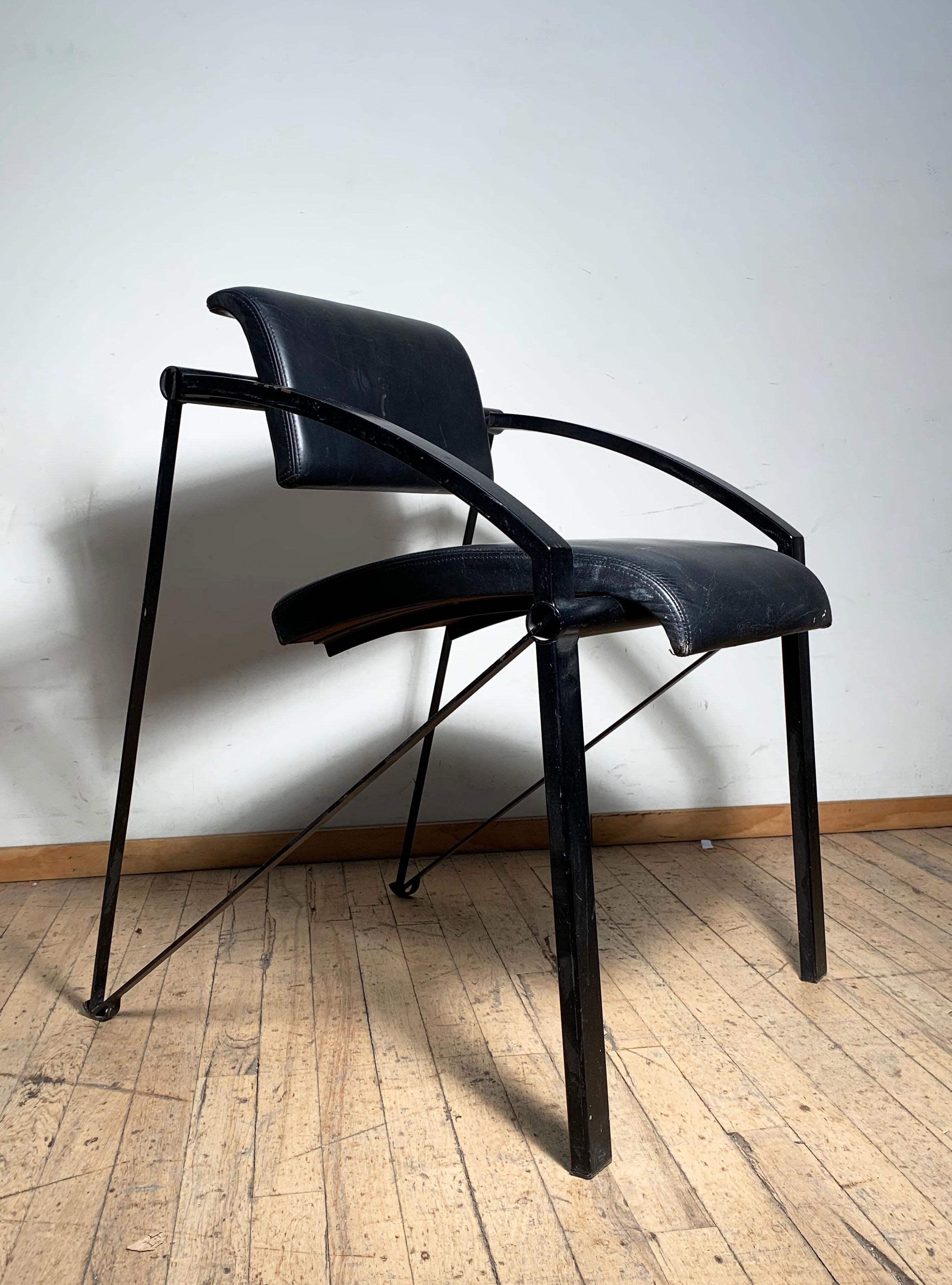 Pair of steel Italian Memphis architectural chairs attributed to Mario Botta. Extreme design with special attention to detail and craftsmanship. Leather seats and Backs. No labels on chairs. 

Total of 4 available.
Unfortunately, the leather was