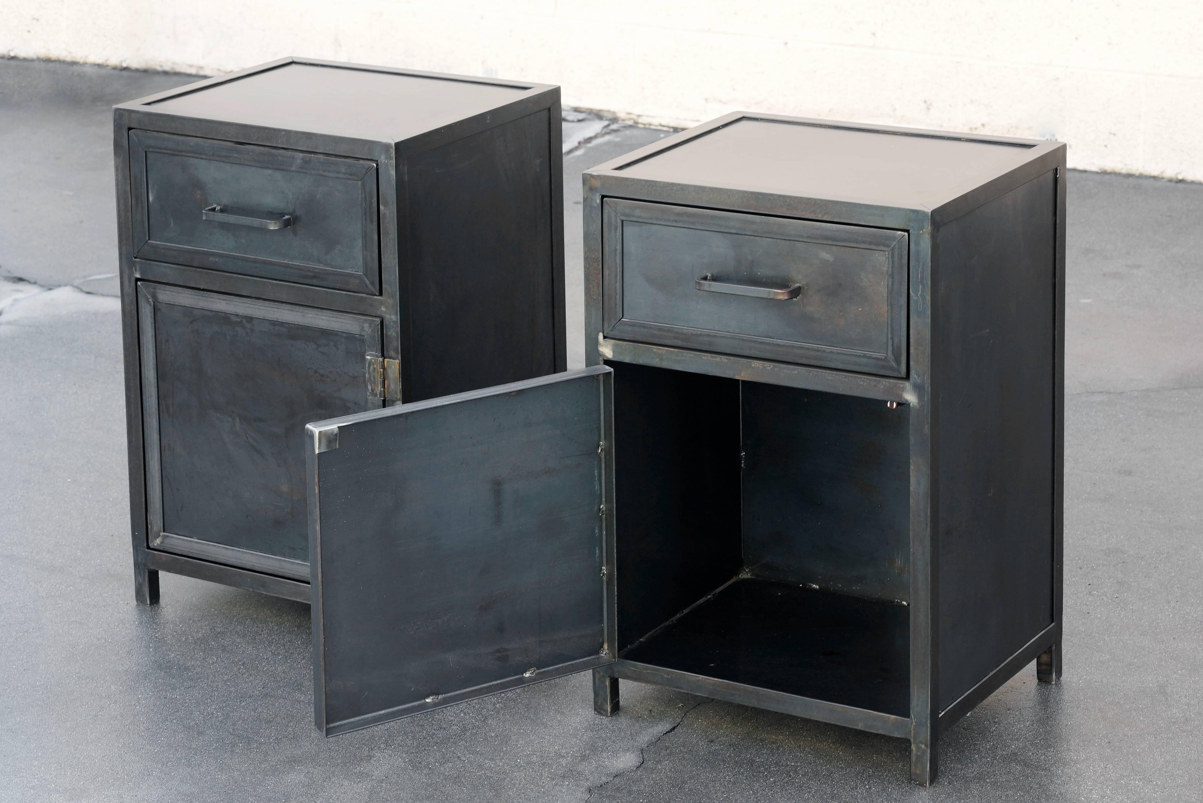 Industrial yet sleek pair of lowboy steel cabinets by Rehab Vintage Interiors, Los Angeles. Designed in the spirit of the Machine Age our cabinets are built with 1