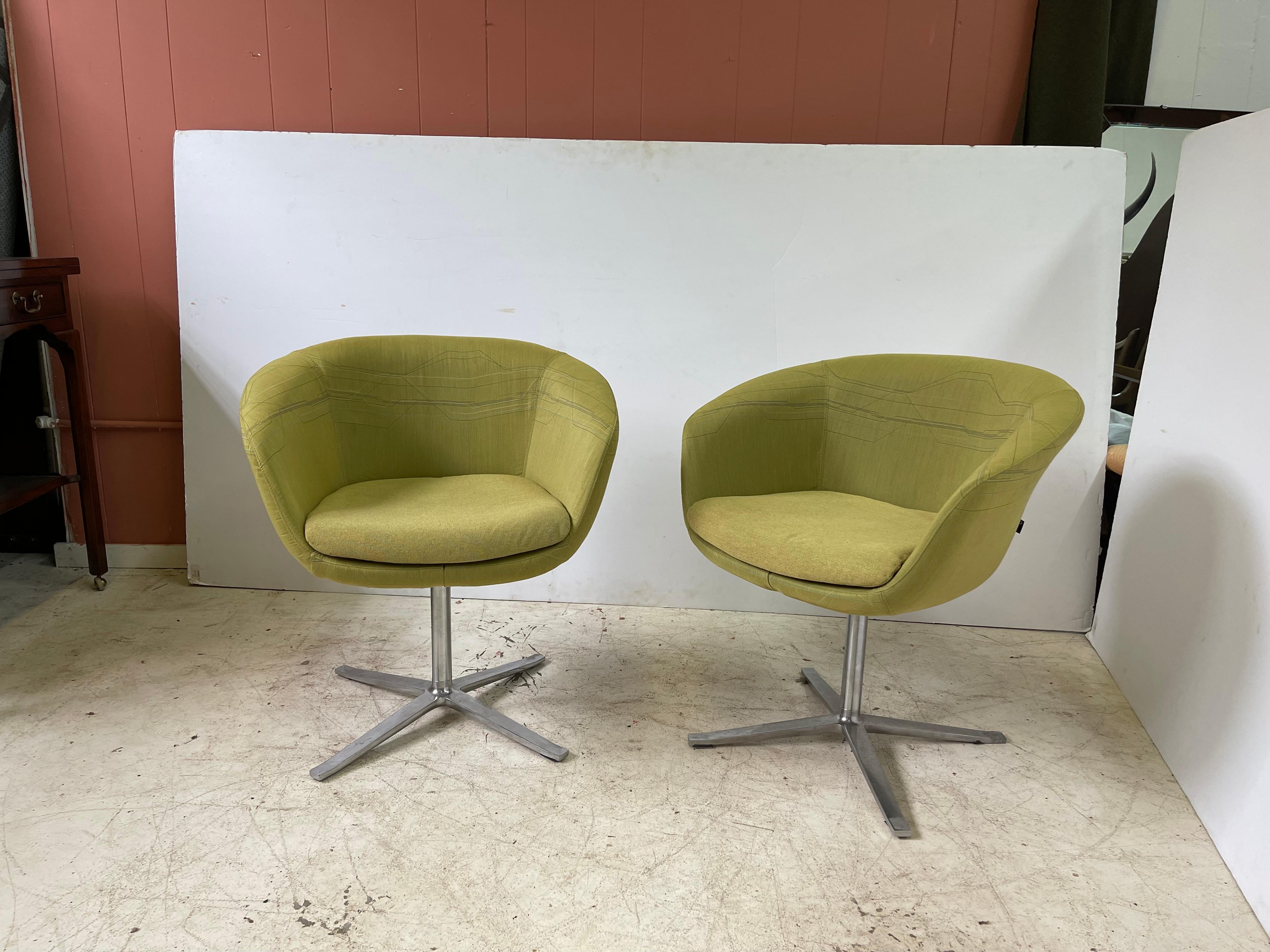 Pair of Steelcase Coalesse chairs from the Bob Collection designed by Pearson Lloyd. The chairs feature the original chartreuse upholstery and rest on chrome swivel bases.