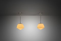 Pair of Stepped Opal Glass Pendant Lamps with Metal Frame, Europe 1940s