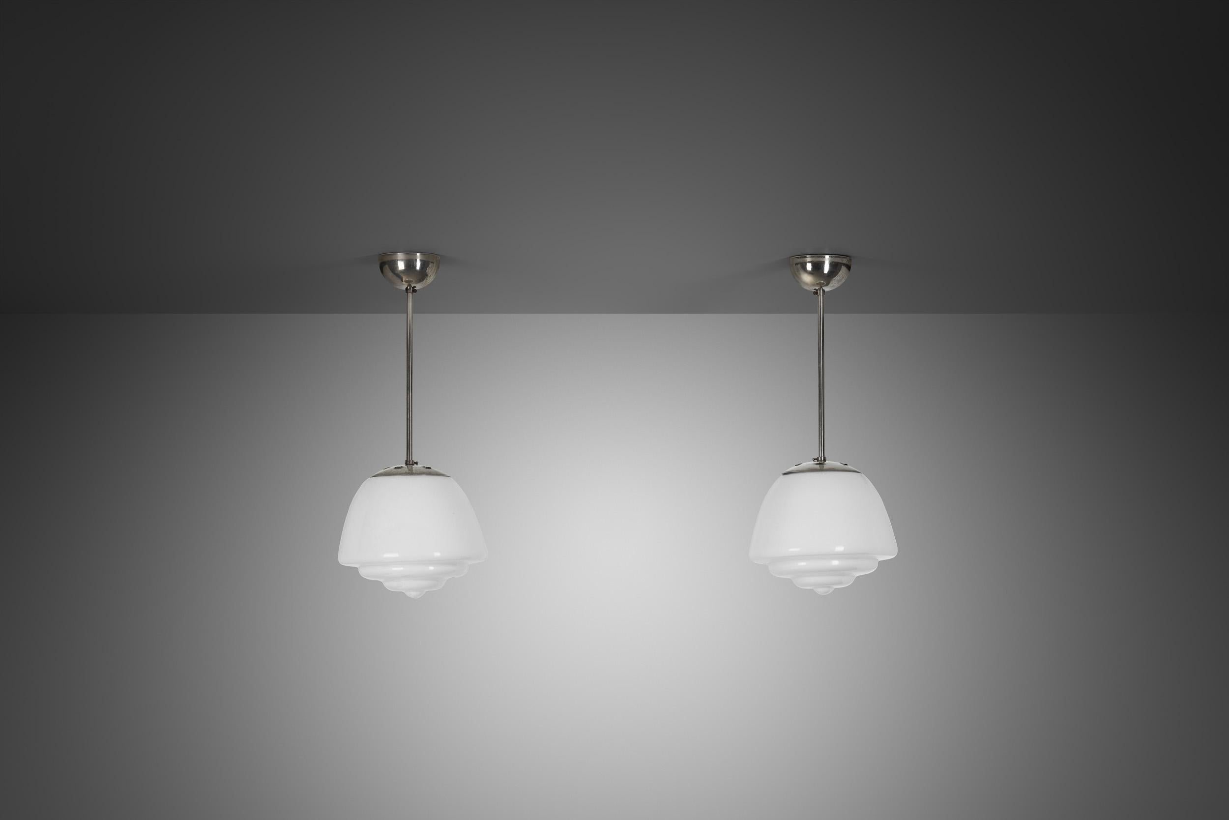 Mid-Century Modern Pair of Stepped Opal Glass Pendant Lamps with Metal Frame, Europe 1940s For Sale