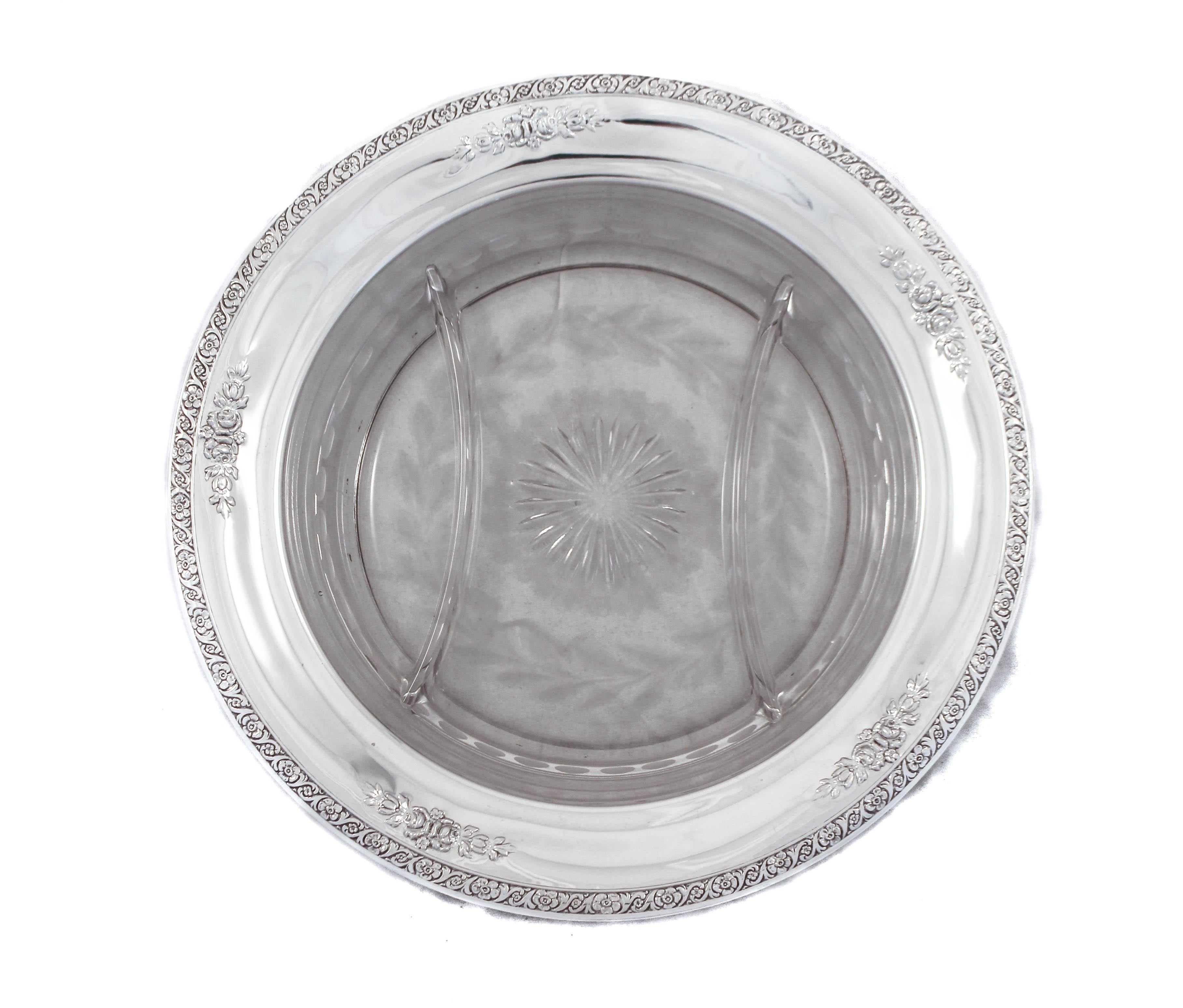We are delighted to offer you this pair of sterling silver and crystal sectionals by Wm. E. Hunt Silver Company of Providence, Rhode Island. Along the sterling silver rim there is a floral pattern that is highlighted with five sets of flowers. The