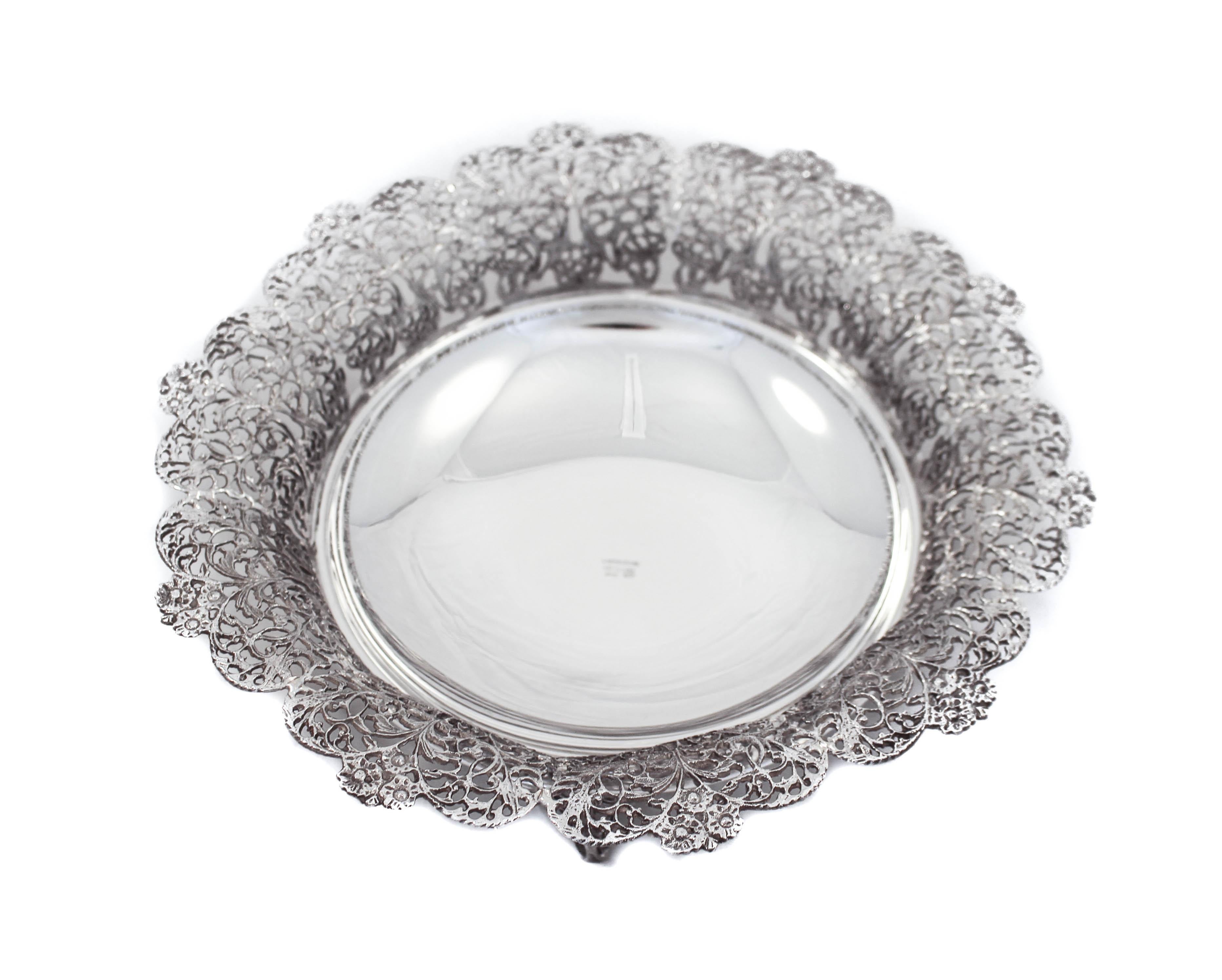 We are thrilled to offer you this pair of sterling silver Italian bowls from the 1970’s. We love pairs and hope you do too!! Each bowl stands on three-legs so it’s propping off the surface. They are reticulated and have a scalloped rim. While the