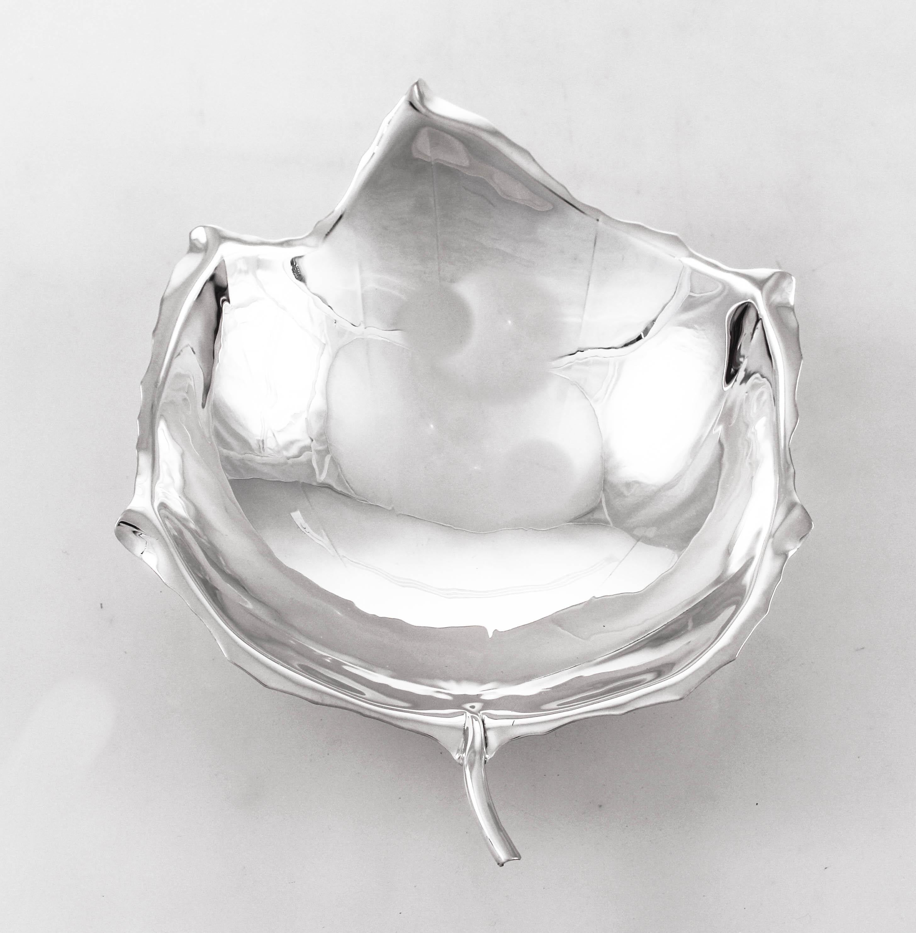 Sciarrotta’s work is characterized by a sleek and simple style, and many of his smaller pieces feature his signature leaf-shape designs. During the 1950s and 1960s, Sciarrotta’s handmade silver serving dishes, bowls, candelabras, vases, trays boxes,
