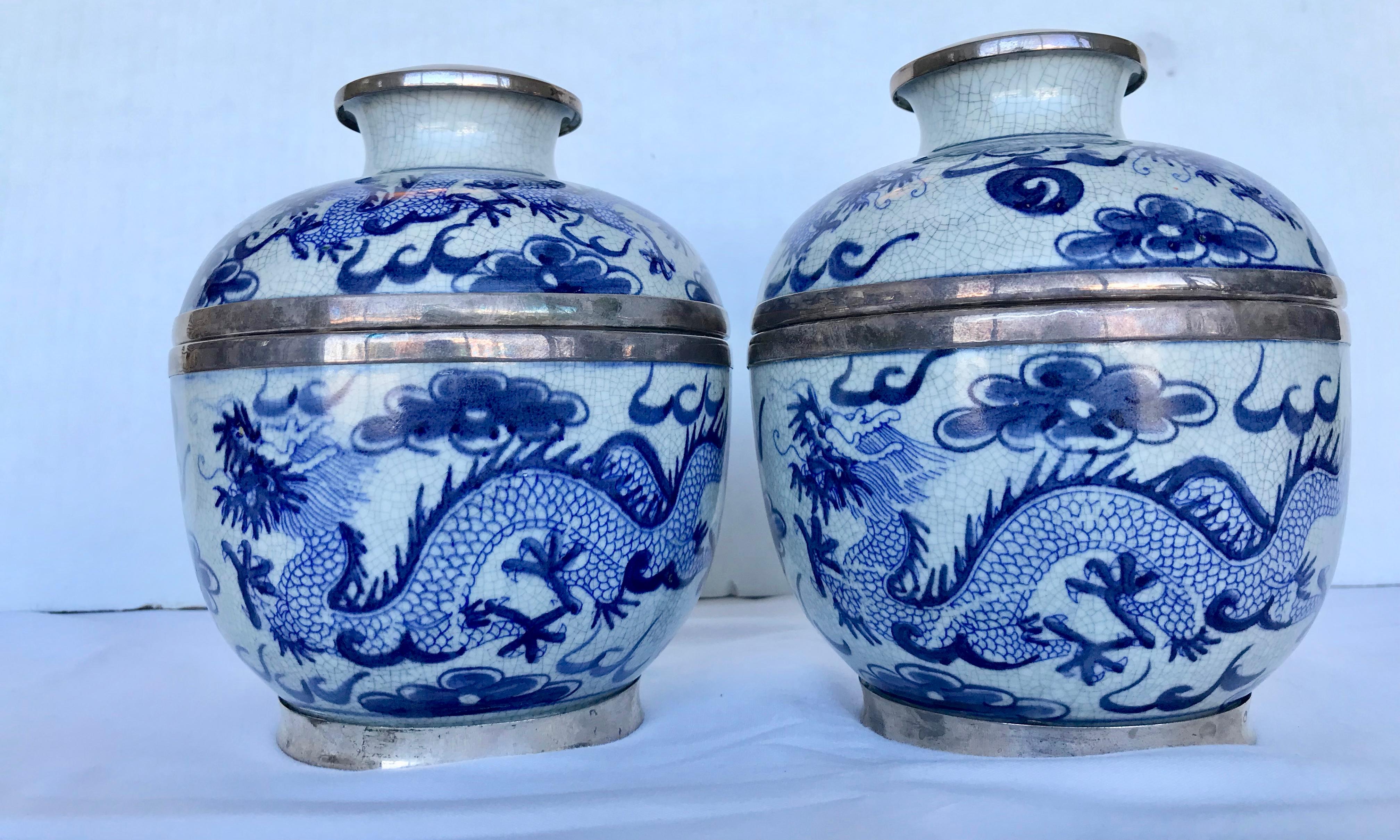 The jars have a 'crackle' glazed finish and are painted with dragons.
A superbly unusual and stunning pair. Lidded.