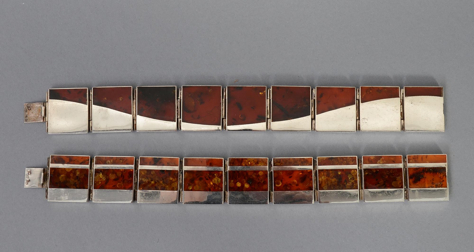 Modernist Pair of Sterling Silver and Amber Bracelets