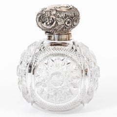 Pair of Sterling Silver and Cut Glass Cologne Bottles