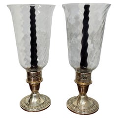 Pareja de candelabros de plata de ley y cristal de huracán