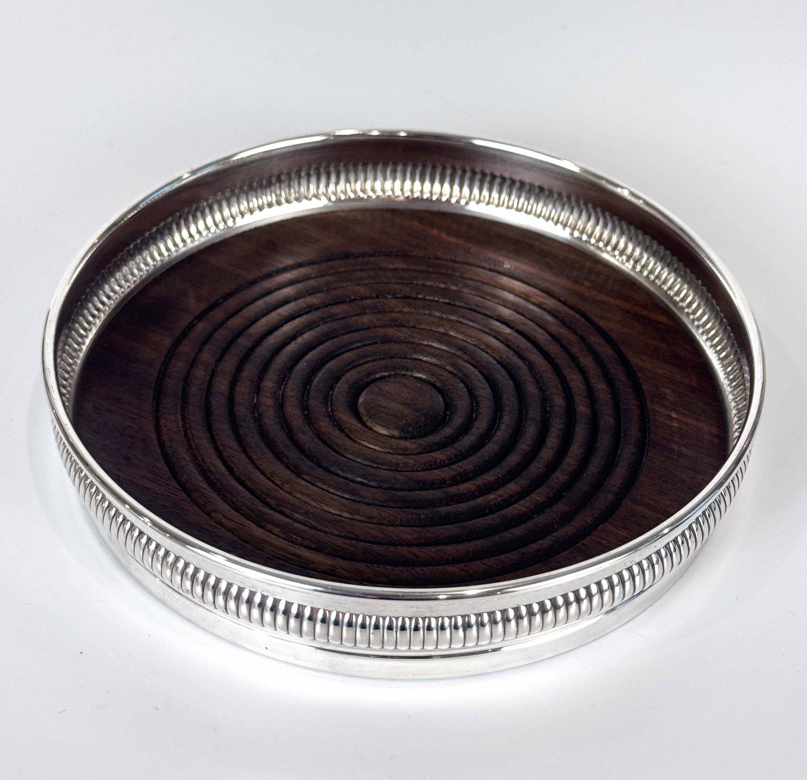 Par de posavasos de vino de plata de ley y madera torneada siglo XX en venta