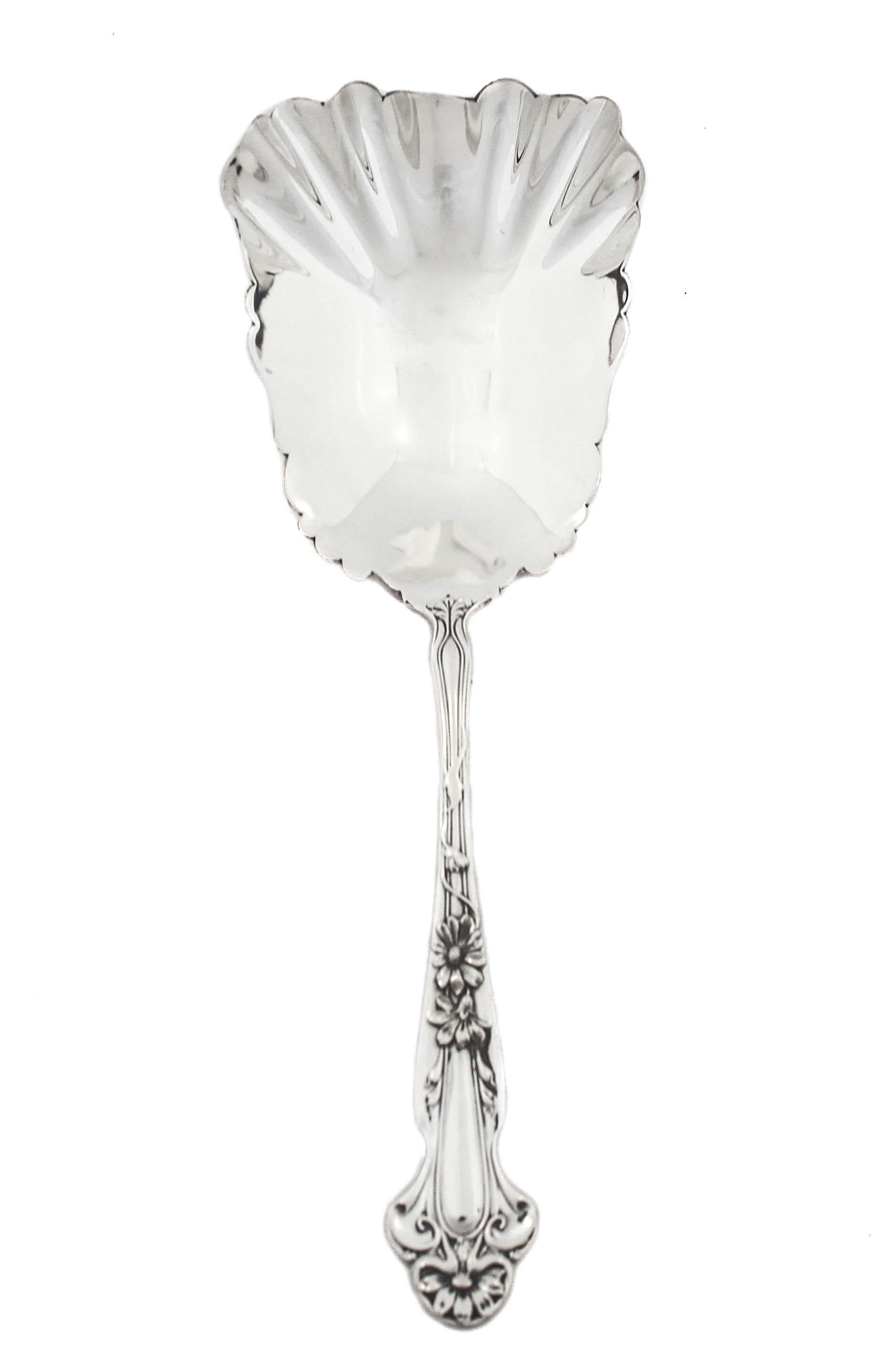 Being offered is an exquisite pair of sterling silver Art Nouveau (extra large) serving spoons by R. Blackington of Massachusetts.  The handles have blossoming flowers and vines wrapping around the handles.  Even the shape is quintessential Art