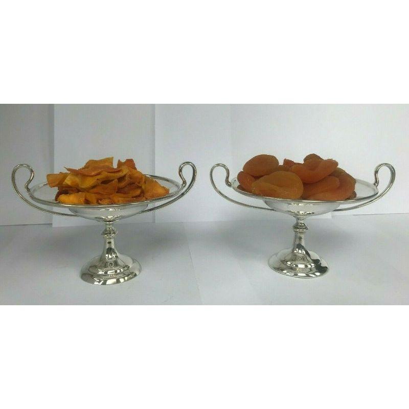 Pair of Sterling Silver Bonbon Dishes by Holland, Aldwinckle & Slater from 1903

In good vintage condition, these are beautiful dishes that would look lovely on any table. Hallmarked: Made by Holland, Aldwinckle & Slater in London in