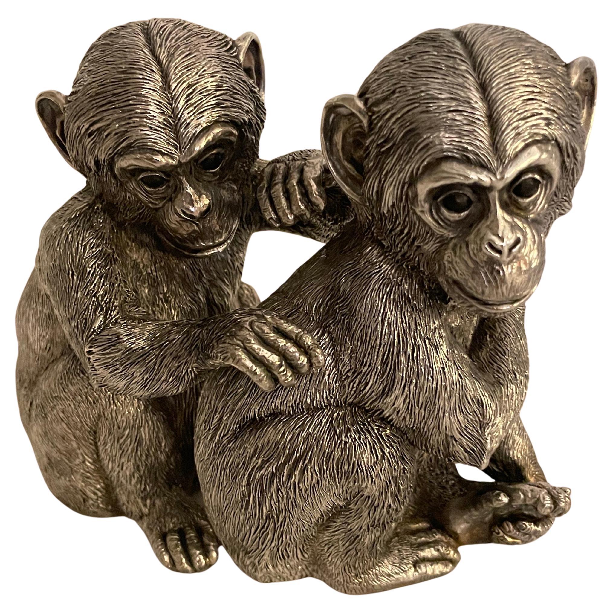 Pair of Sterling Silver Clad Embracing Chimpanzees by William Comyns For Sale