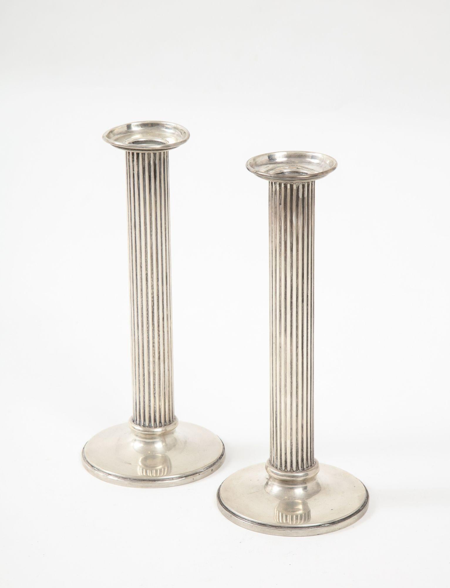 A great Pair of Sterling Silver Fluted Weighted Candlesticks signed Hamilton Sterling