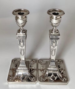 Pair Of Sterling Silver Neoclassical Candlesticks Decorated with Urns