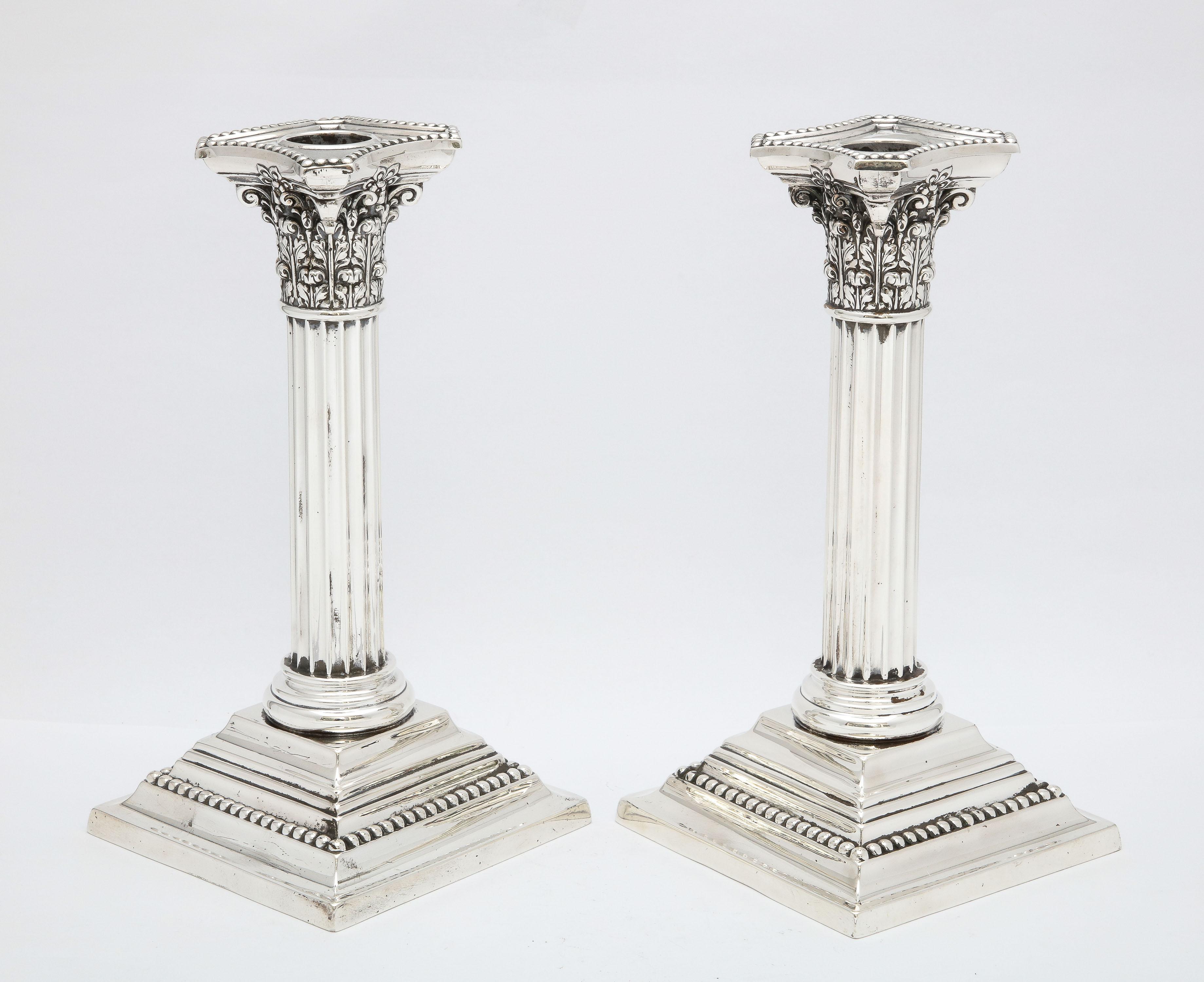 Early 20th Century Pair of Sterling Silver Neoclassical-Style Corinthian Column Candlesticks