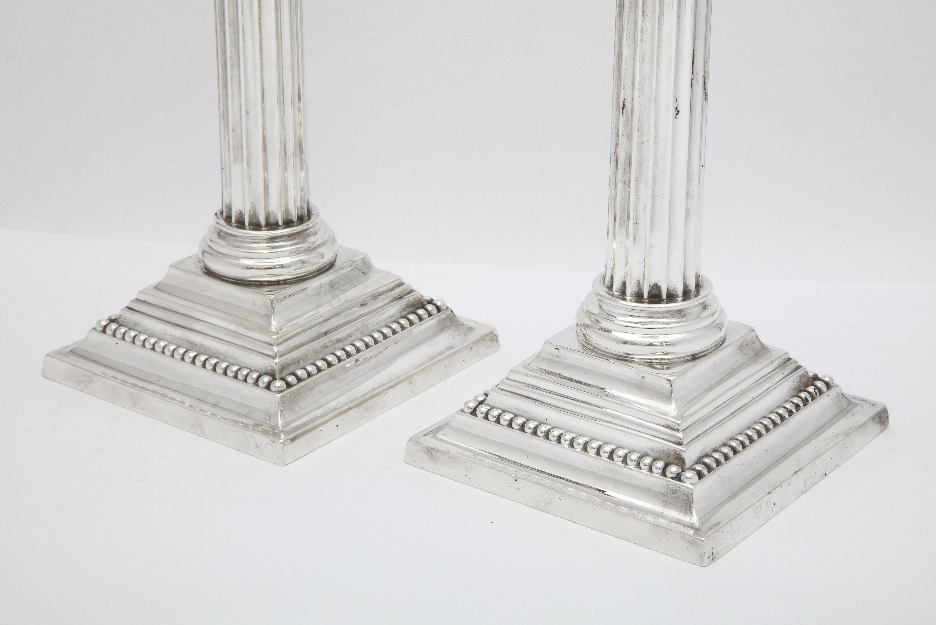 Early 20th Century Pair of Sterling Silver Neoclassical-Style Corinthian Column-Form Candlesticks