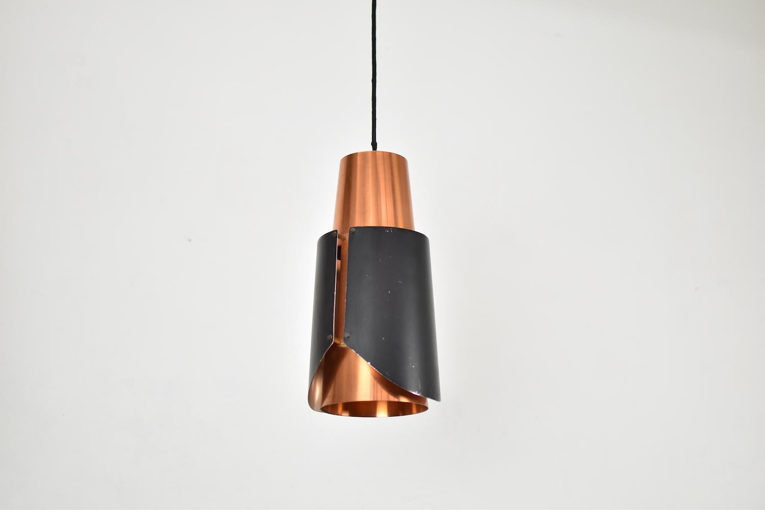 Great pair of ‘Østerport’ pendants by Bent Karlby for Lyfa, Denmark, 1960s. The lamp shades are made of thin copper and lacquered metal. Very good original condition with norma signs of wear. Quite rare!