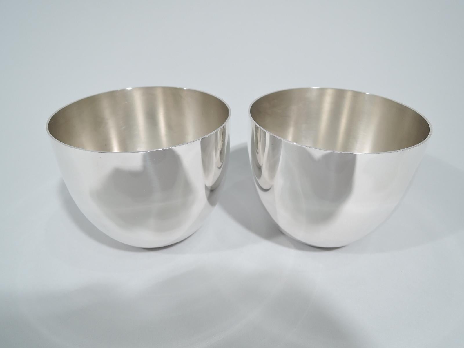 Pair of sterling silver Jefferson cups. Made by Stieff in Baltimore. Each: Straight sides and curved bottom. Easy grip with a gentle, soothing rock. Great for a lockdown twosome tipple. Fully marked including no. 0709/15 and phrase “Jefferson Cup”.