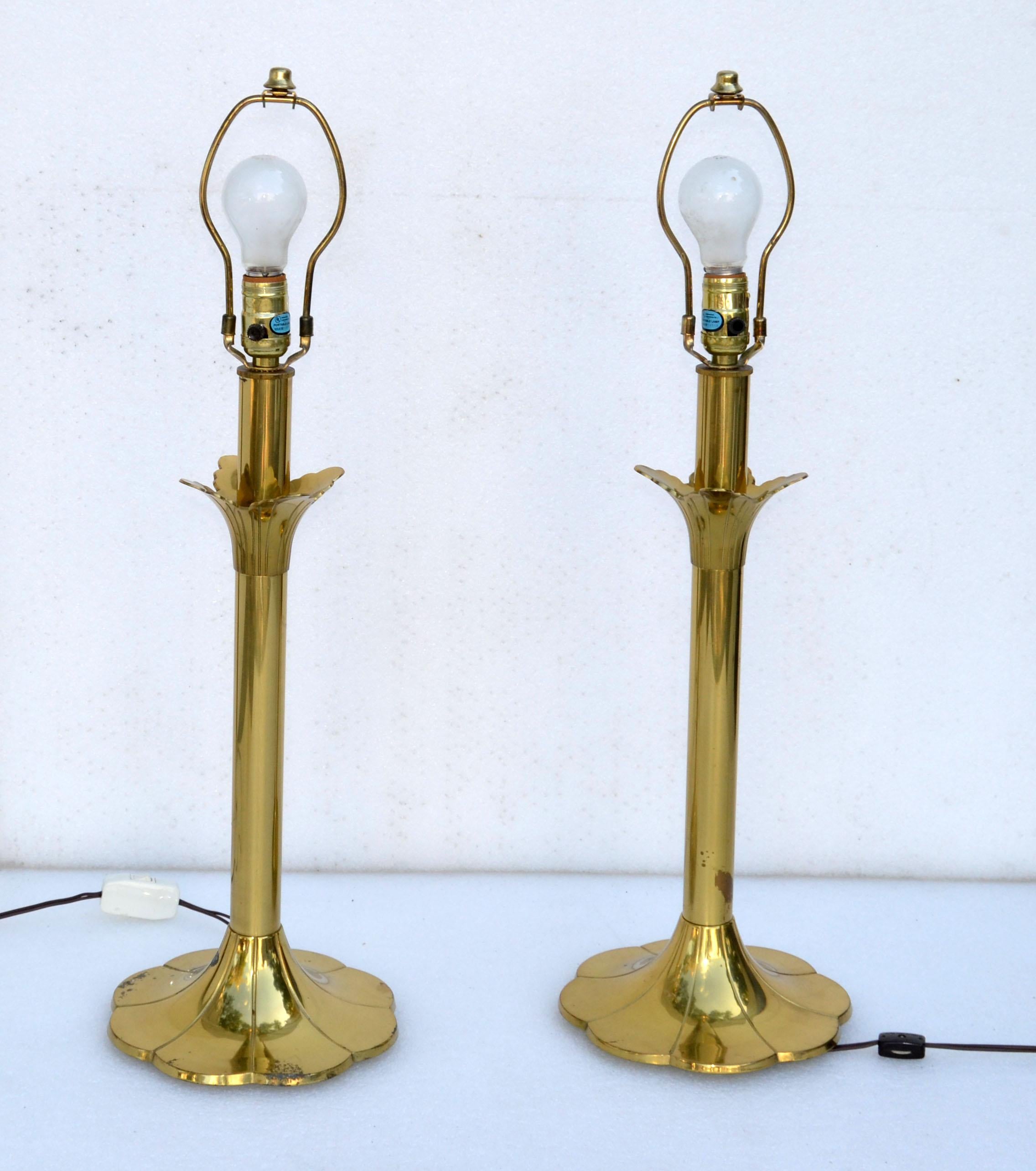 Pair of Modern polished Brass Stiffel Table Lamps Model Number 6163.
They come with Harp, Finial and Shades.
US rewiring, UL Listed and work with a regular or LED Light Bulb.
Makers Foil Label underneath one Lamp.
Felt Cover at the Base to