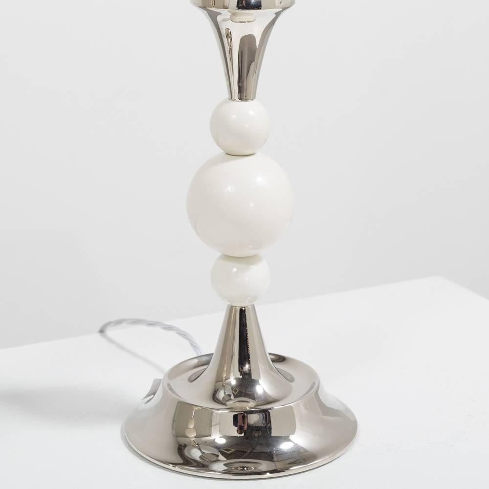  Pair of Nickel Plated Table Lamps with White Painted Spherical Detail by Stiffel 1950s Newly restored by our team 
Custom made new shades have been made for this pair of lamps that have been replated by our team as well as full wiring restoration