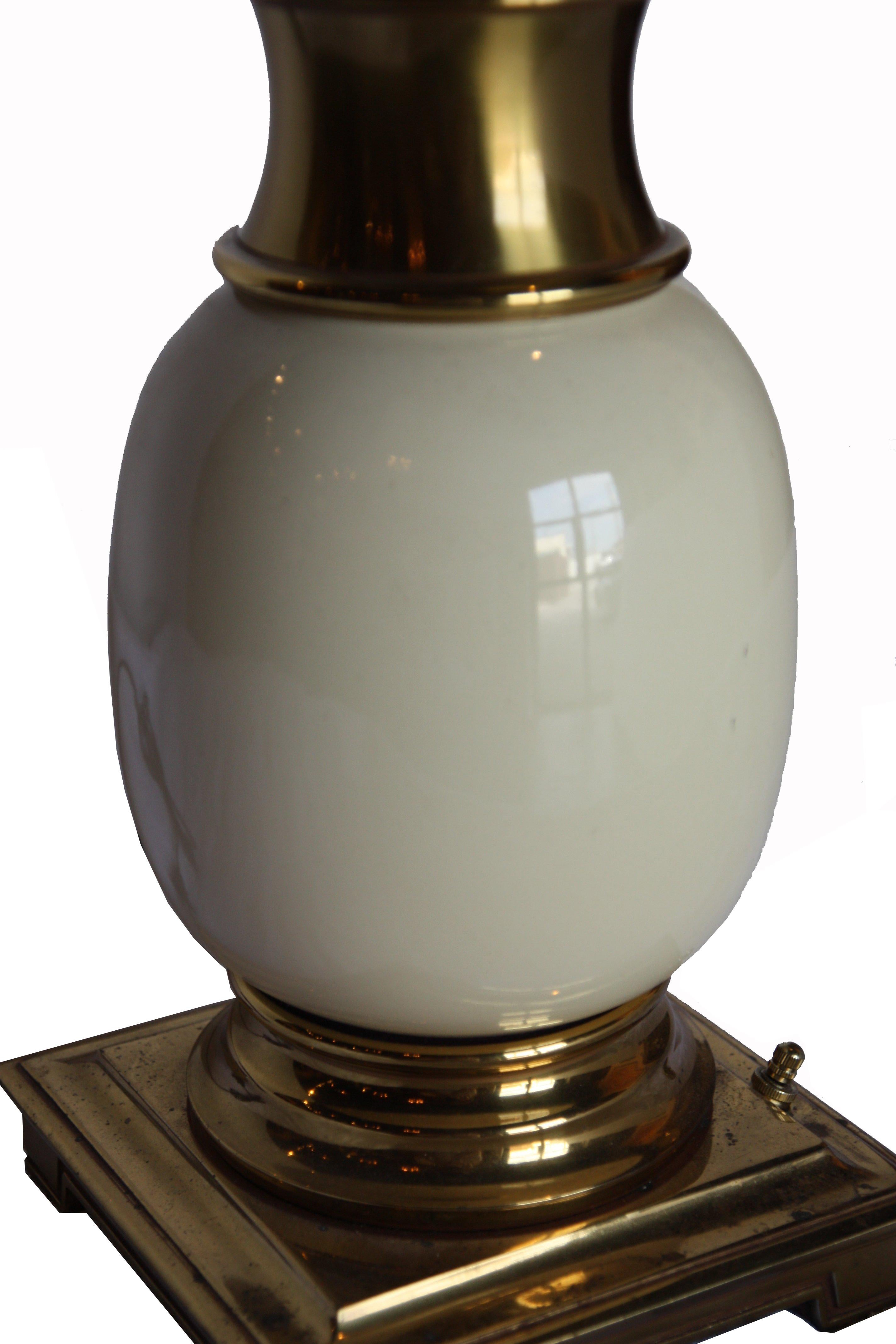 Pair of Stiffel polished brass table lamps with porcelain 