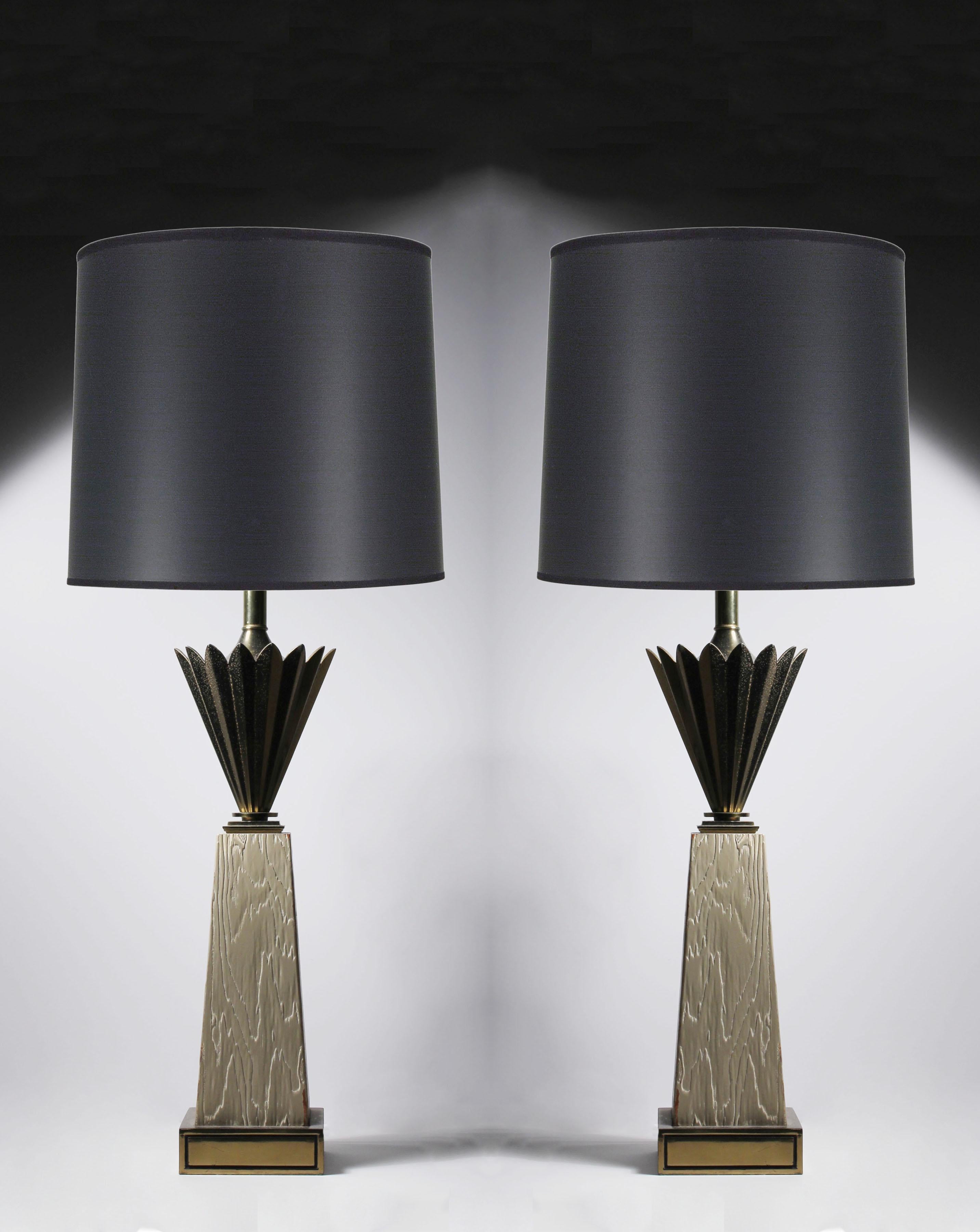 Pair of Stiffel table lamps (wood bases) with deco Hollywood Regency style form
glass diffusers included.  In the manner of Tommi Parzinger

Measures: 31.75