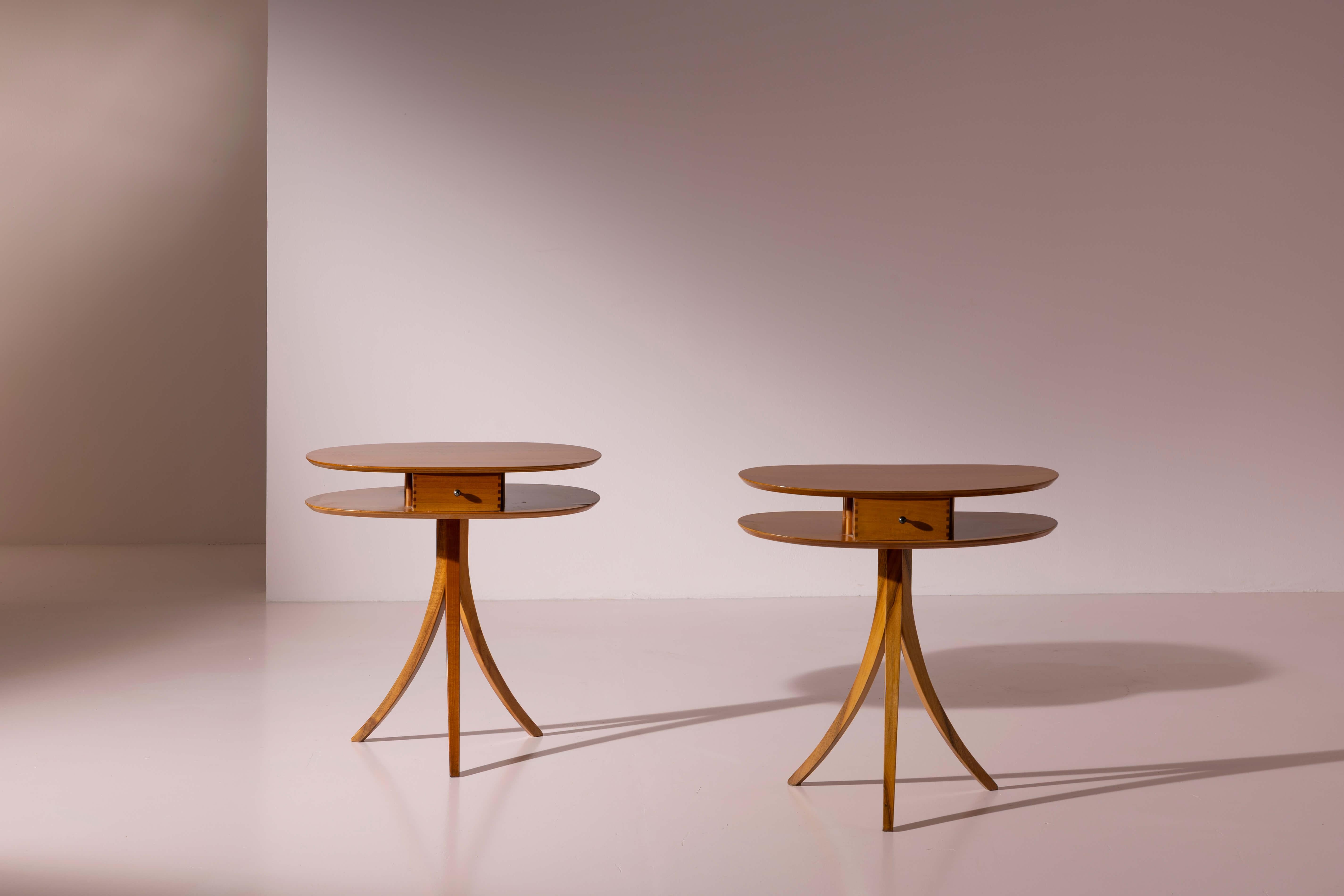 A pair of cherrywood side tables with drawer and double tier, Italian manufacture, Stildomus production, 1990s.

A synonym of discreet elegance and refined style, the Stildomus brand embodies the contemporary Roman approach to interior design. In