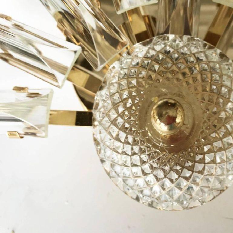Superb pair of Stilkronen sconces. Crystal and brass two-light, 60 watt max bulb.
 Have a look on our the largest collection of French and Italian Mid-Century period sconces, more than 200 pairs.