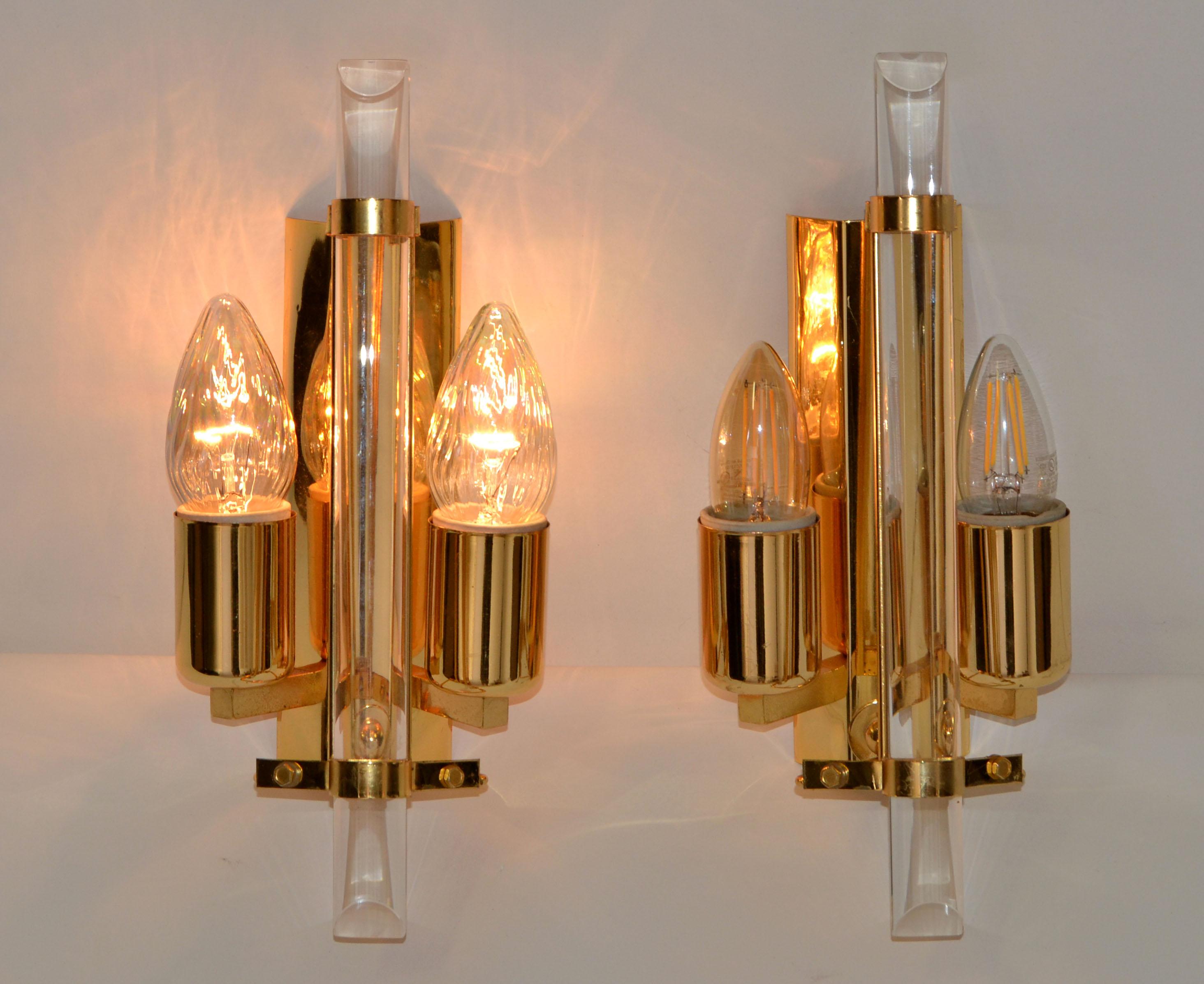 Superb pair of Italian 2 lights Stilkronen sconces, Mid-Century Modern wall lights with Crystal on Gold Plated Frame.
US wiring and each Sconce takes 2 bulbs, 60 watts max.
Back plate: 8.25 x 2.25 inches. 

 