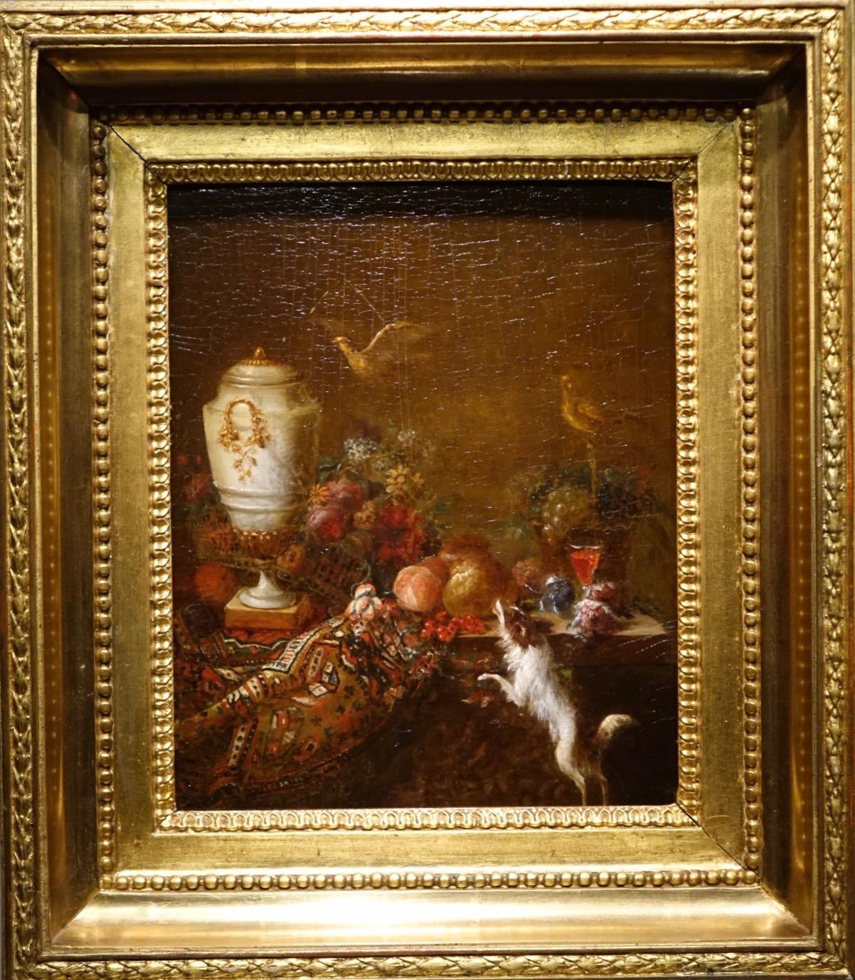 Pair of paintings, oil on oak panels, representing still life with birds, dog, flowers, fruits, vases and carpets on entablatures.
On the first painting, we see a parrot tasting a fruit, a dog on the left, on the edge of a window, watching him.
On