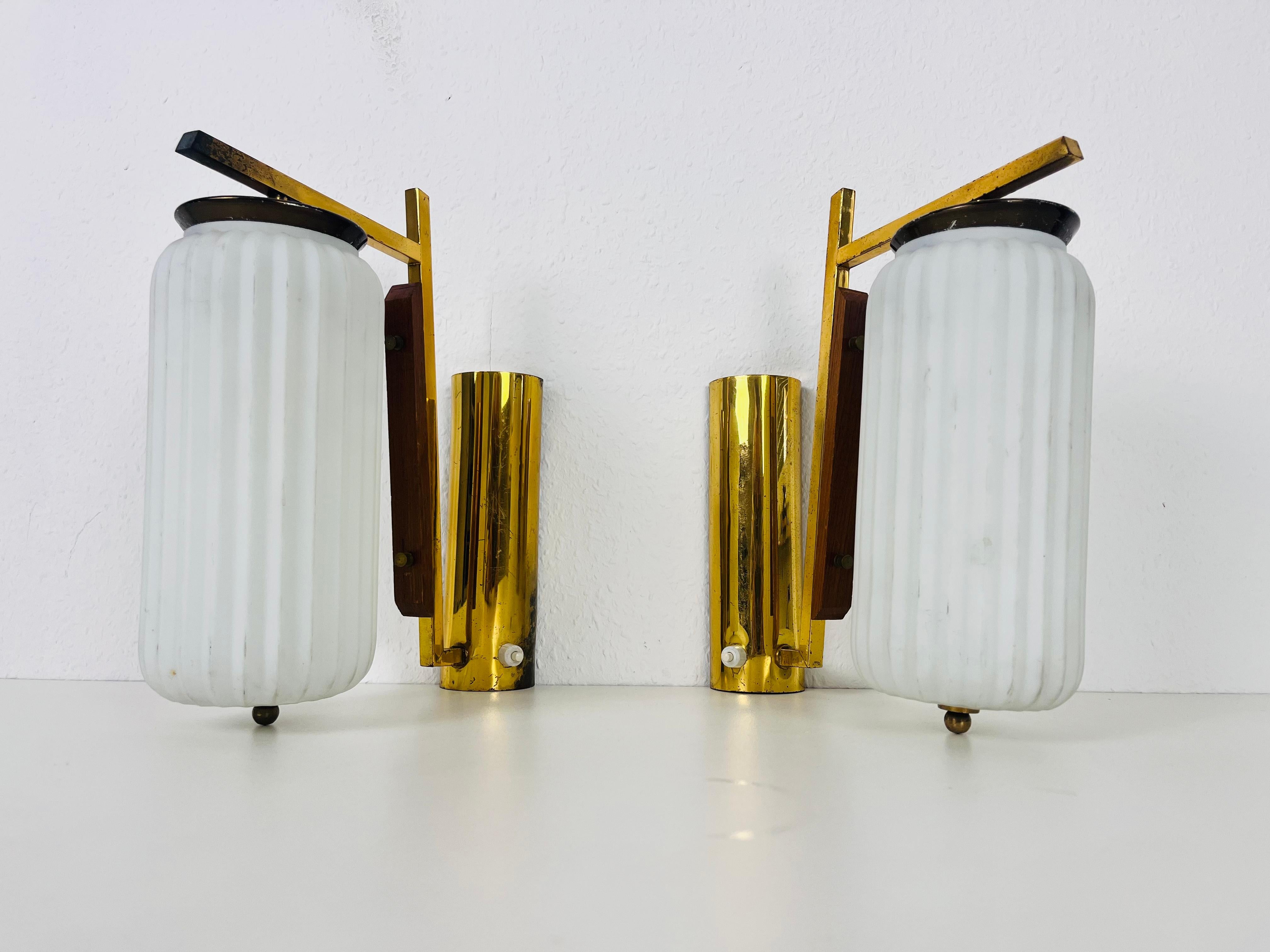 Mid-20th Century Pair of Stilnovo Brass and Opaline Glass Wall Lamps, Italy, 1960s For Sale