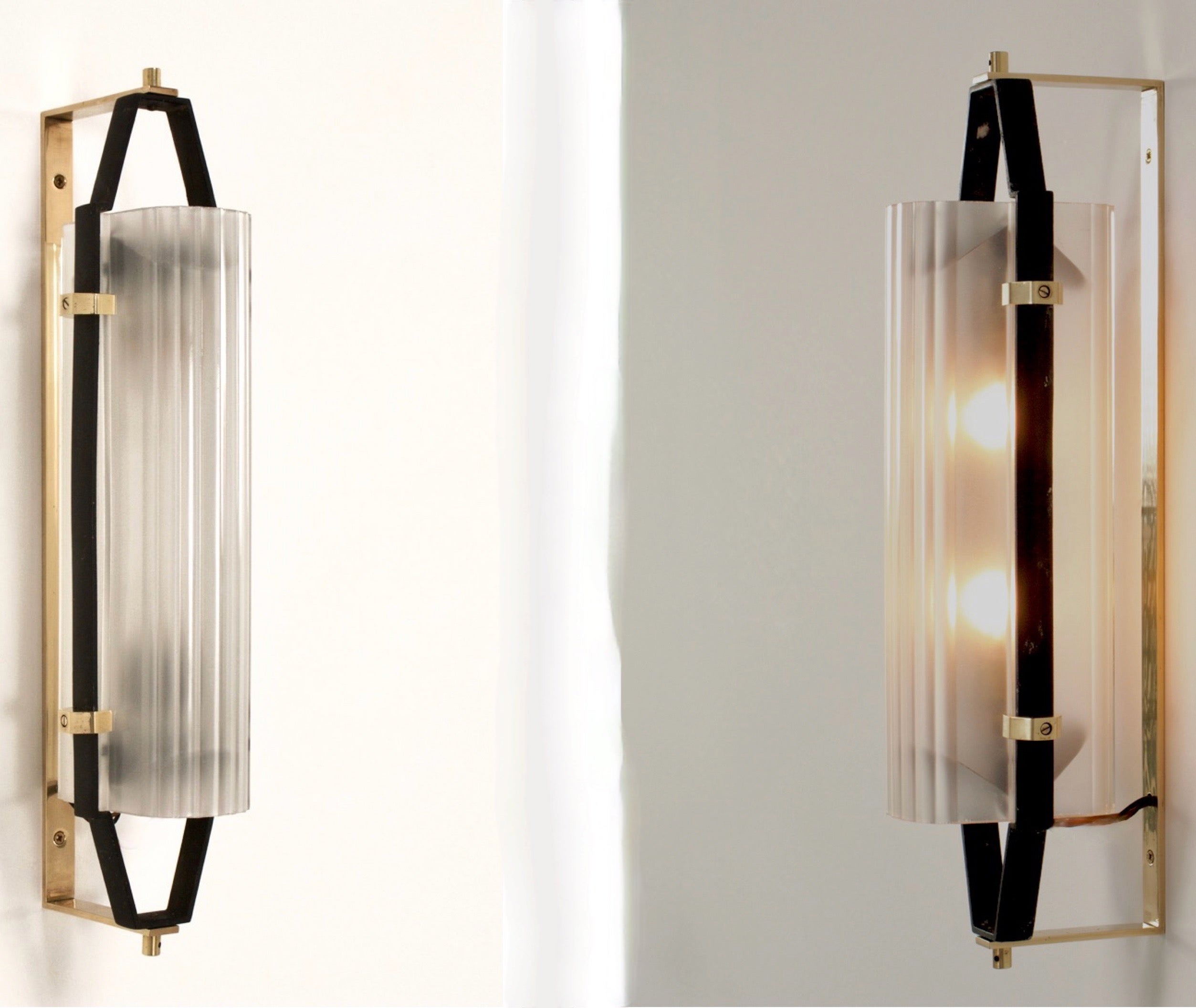 Very rare pair of wall lamps attributed to Stilnovo, Italy, ca 1955. Diffuse light from within a shaped ribbed glass house in a blackened steel flat bar frame that mounts from a solid brass flat bar bracket.
We acquired these in Italy as part of a