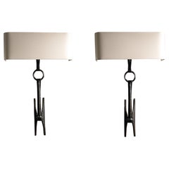 Pareja de apliques de bronce "Estribos", de Félix Agostini