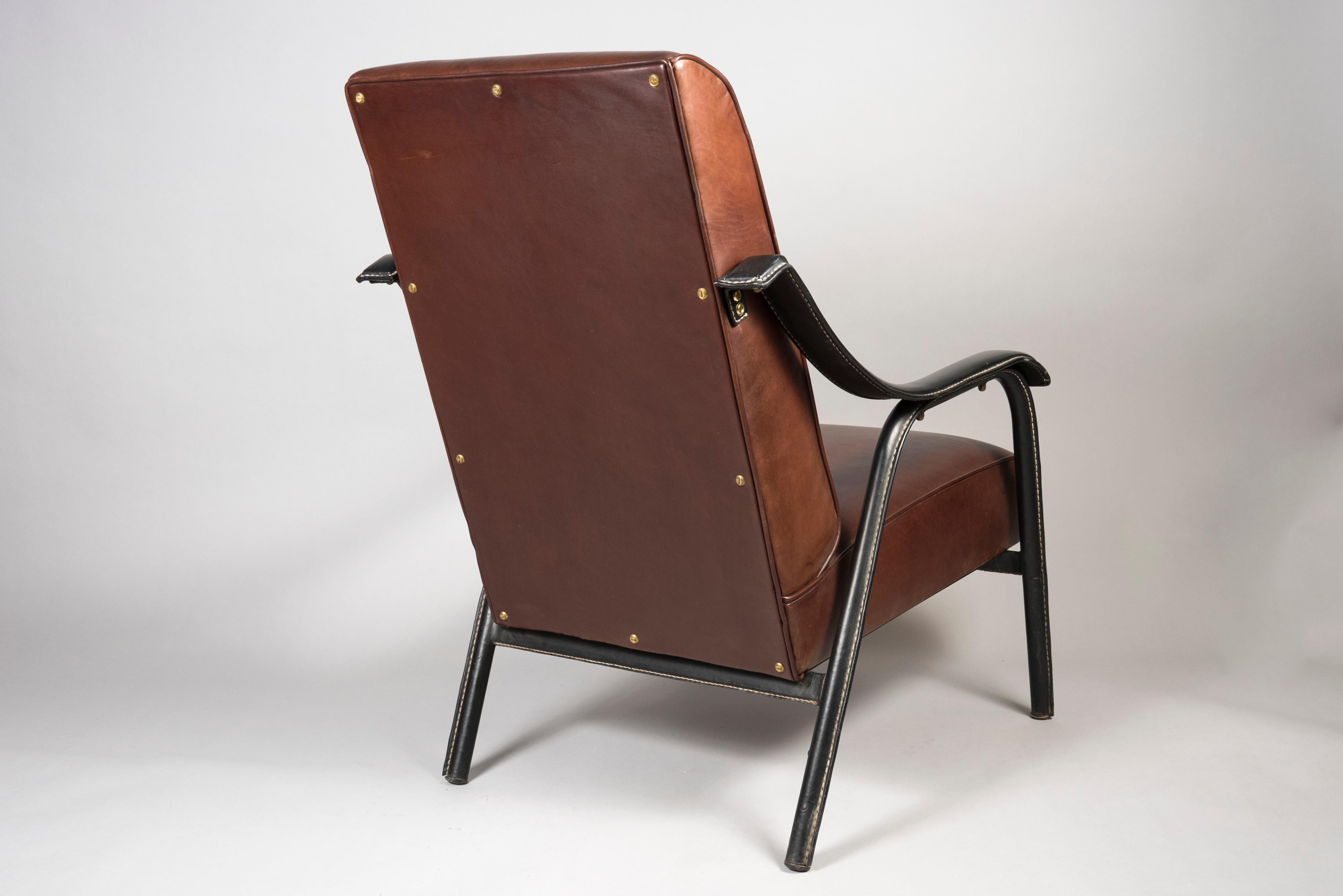 Mid-20th Century Pair of Stitched Leather Armchairs by Jacques Adnet For Sale