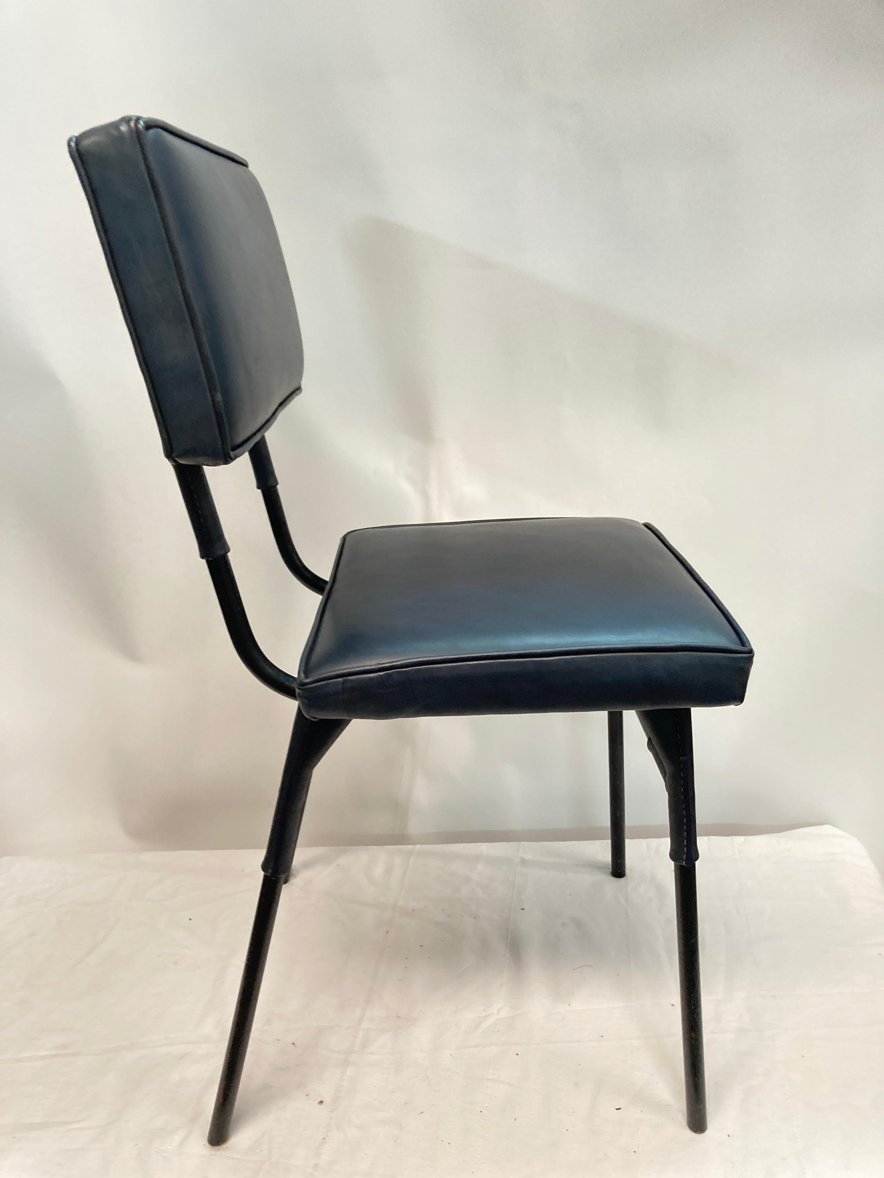 Metal Pair of Stitched leather chairs by Jacques Adnet For Sale