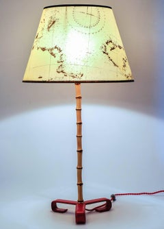Paire de lampes en cuir cousues de Jacques Adnet