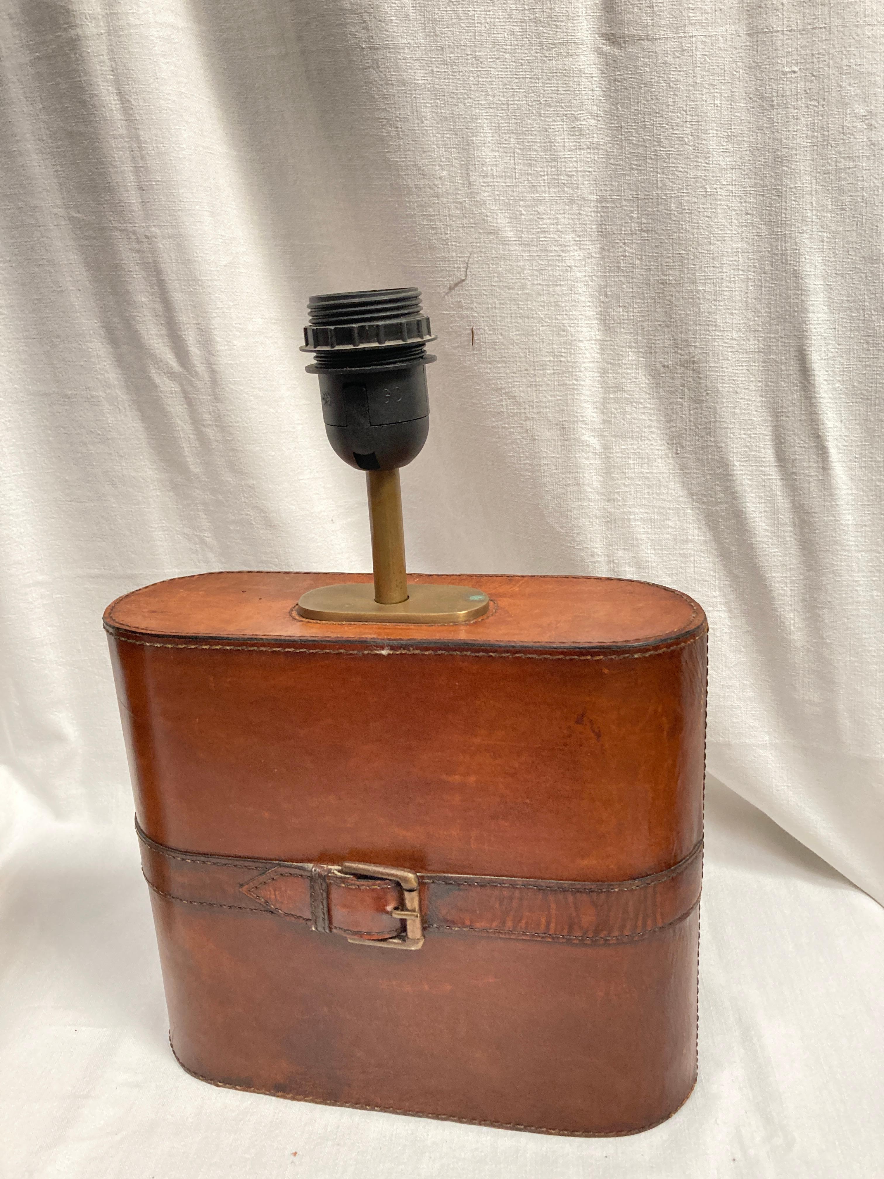French Pair of Stitched leather lamp in the style of Jacques Adnet