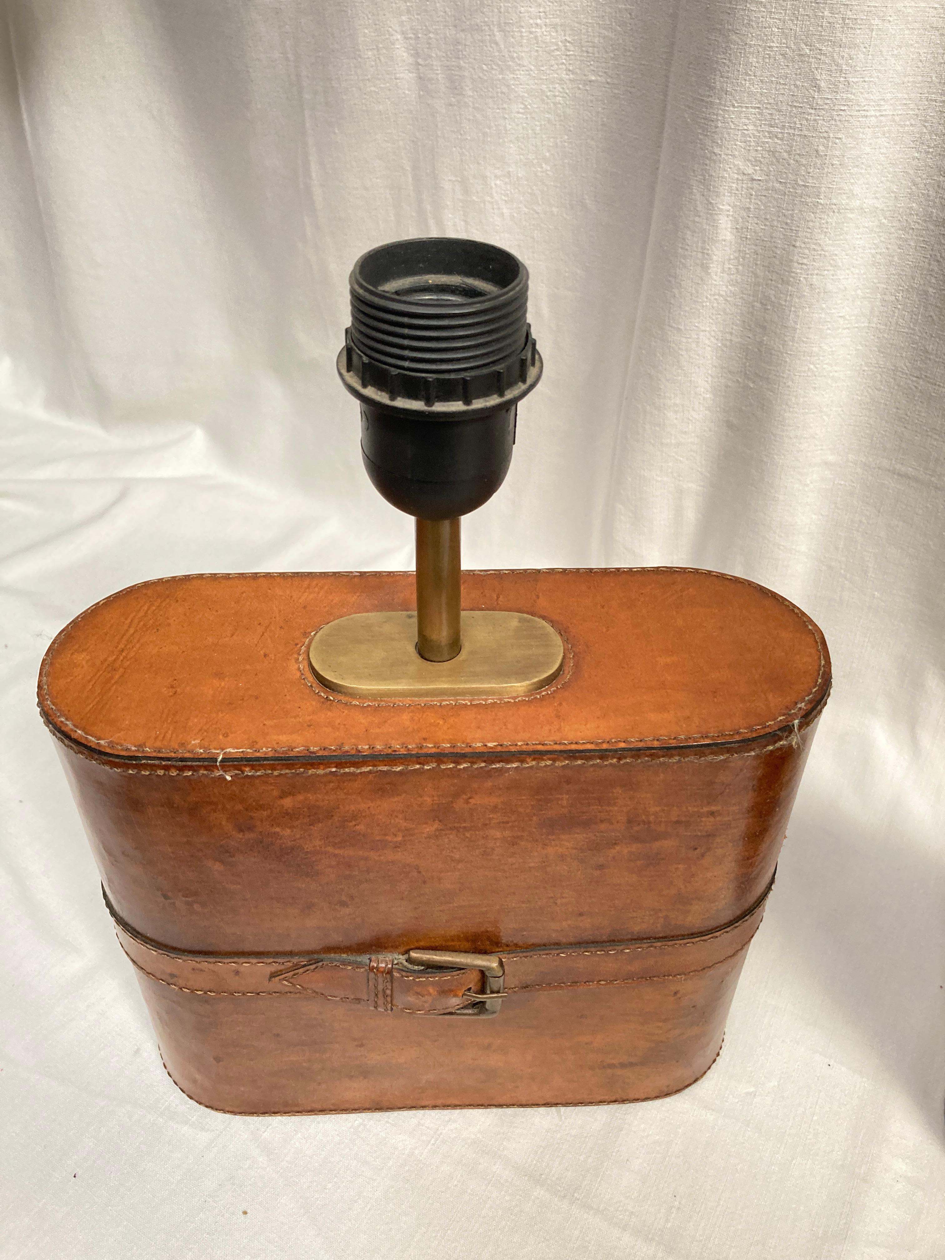 Leather Pair of Stitched leather lamp in the style of Jacques Adnet
