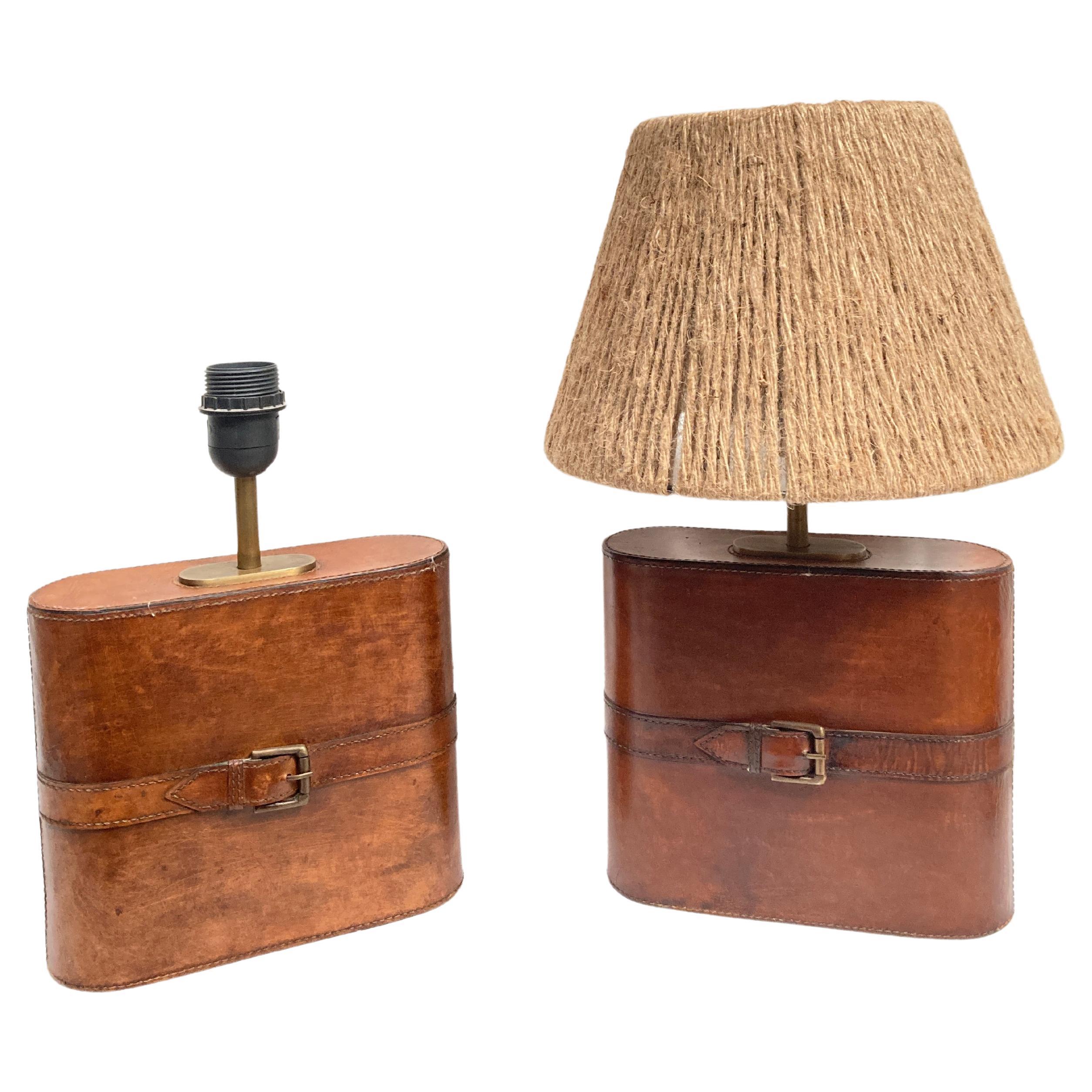 Pair of Stitched leather lamp in the style of Jacques Adnet For Sale