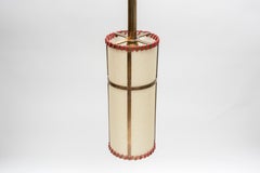 Coppia di ciondoli in pelle Stitch by Jacques Adnet