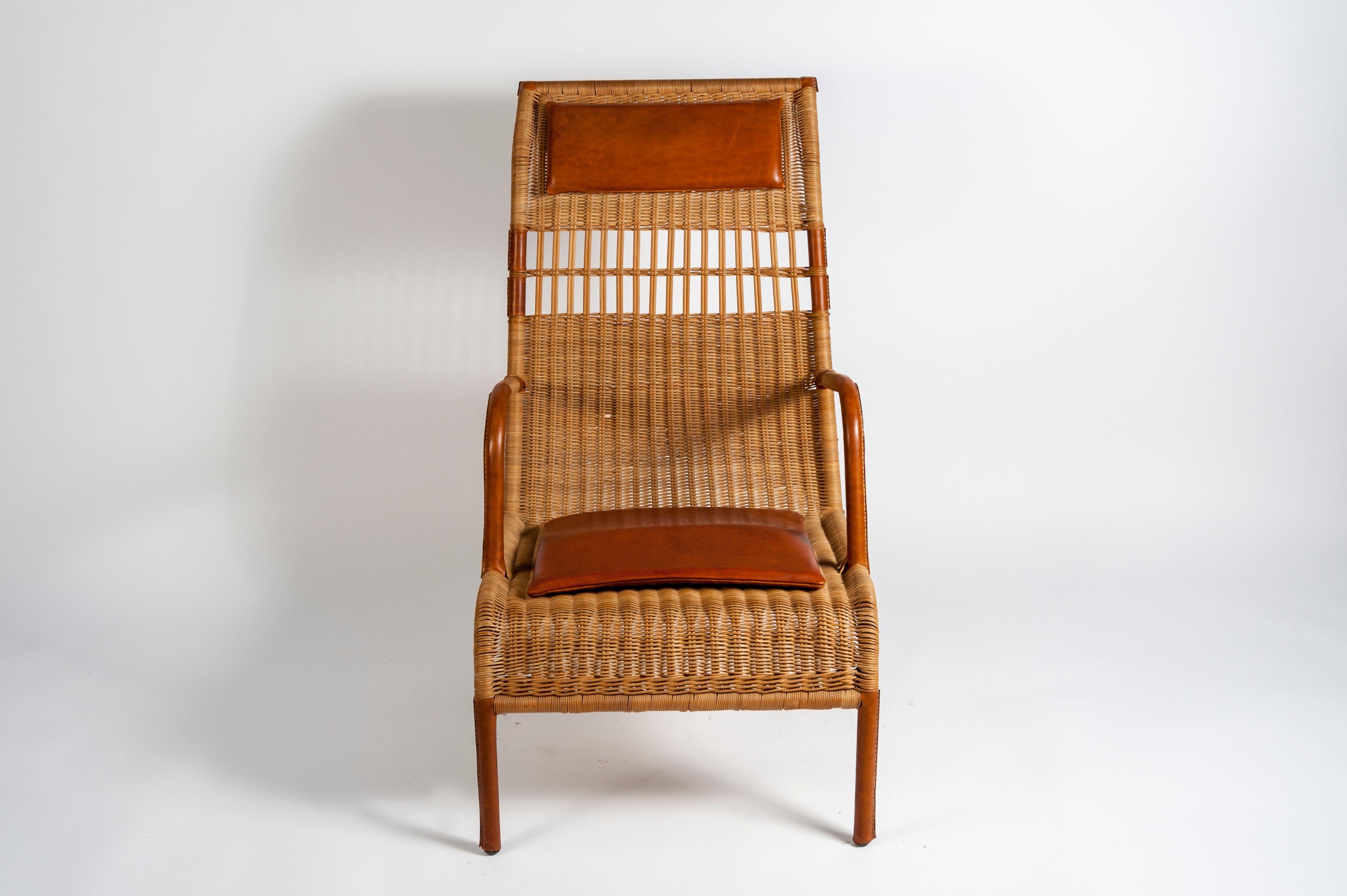 Pair of Stitched Leather and Rattan Armchairs by Jacques Adnet 1