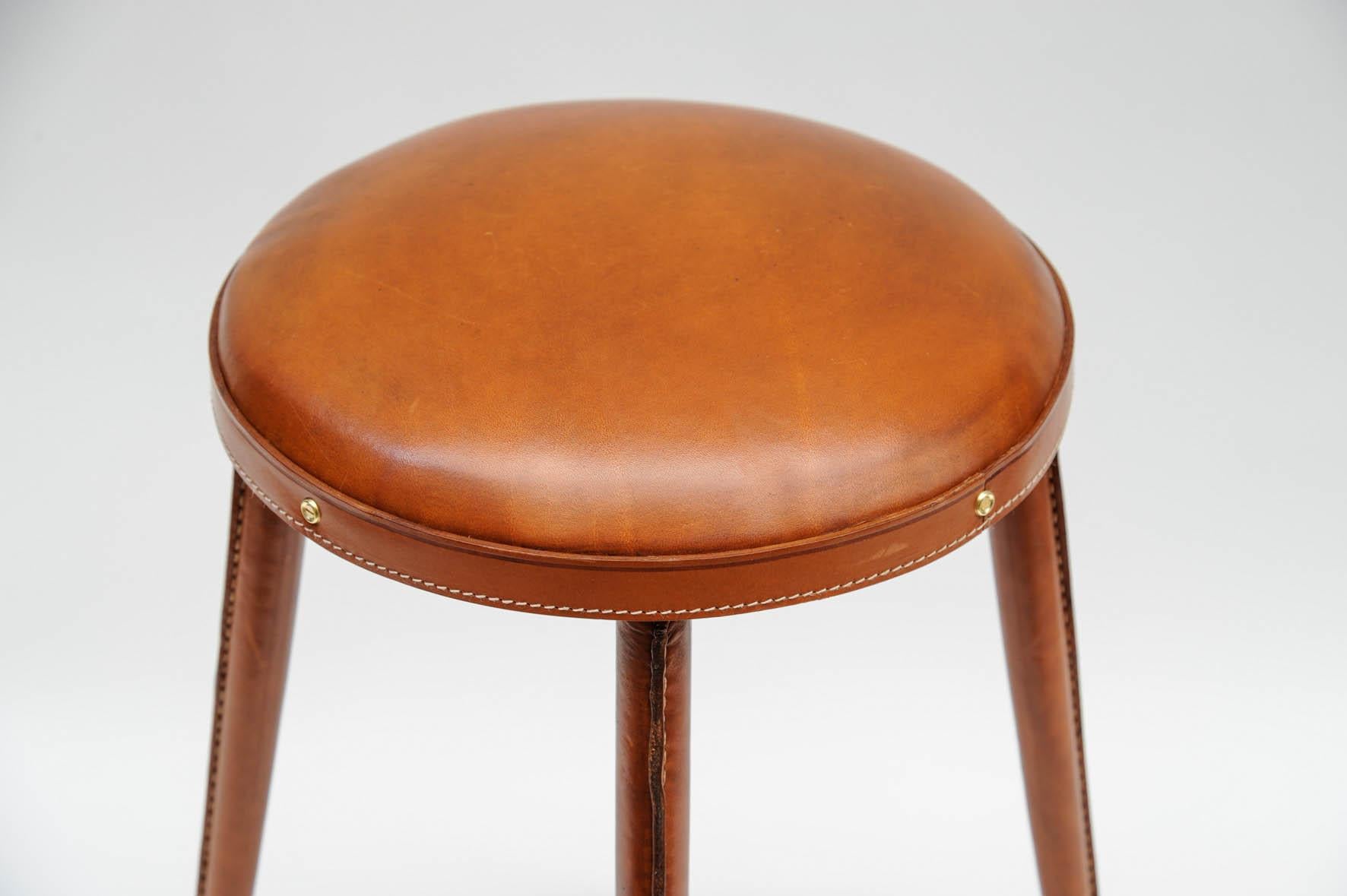 French Pair of Stitched Leather Stools by Jacques Adnet