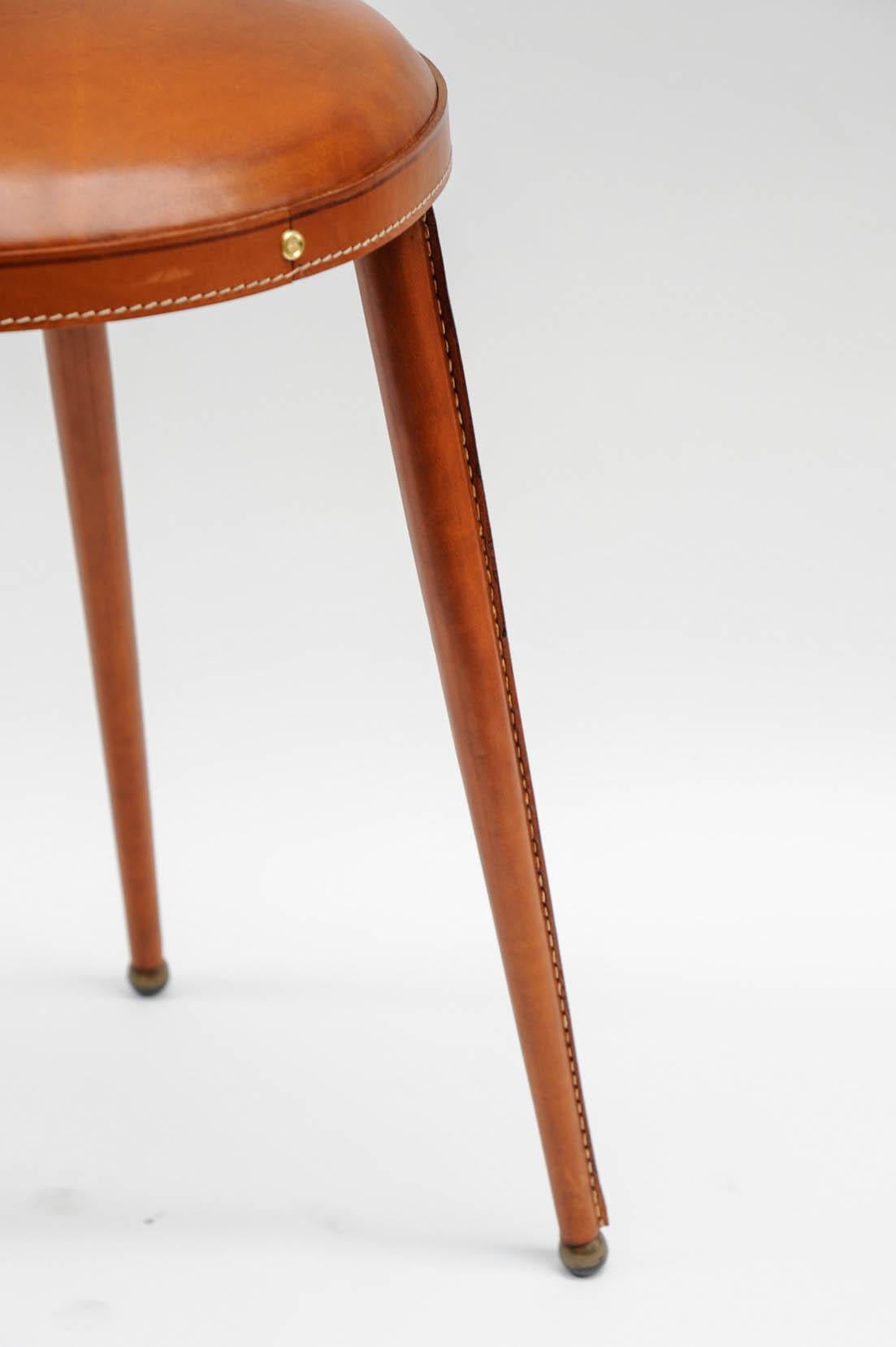 Mid-20th Century Pair of Stitched Leather Stools by Jacques Adnet