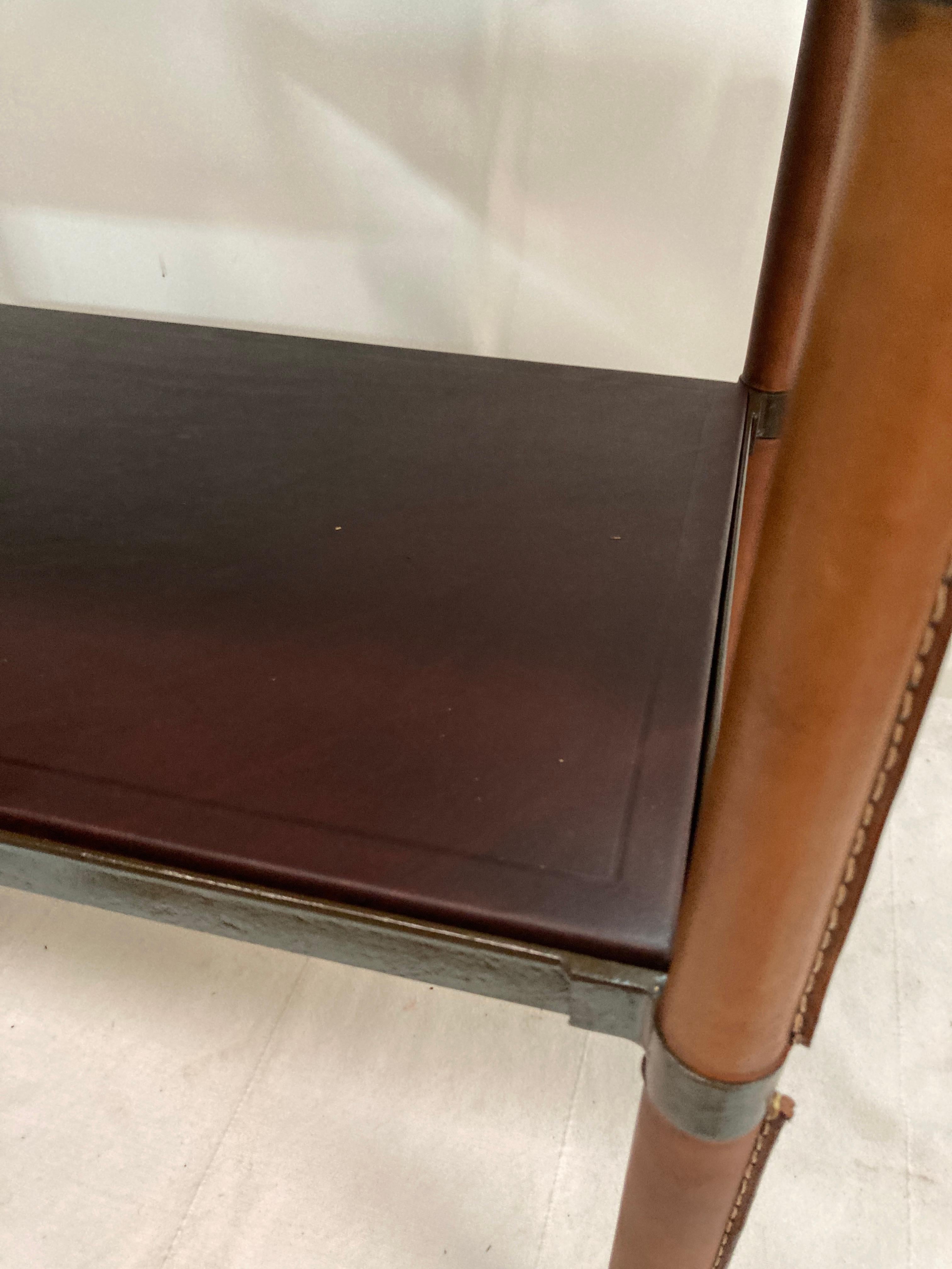 Pair of stitched leather tables by Jacques Adnet For Sale 1