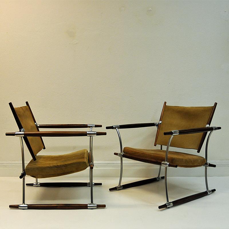 Here comes a great piece of midcentury modern art! A pair of 'Stokke' chair or `the Stick` chair designed by Danish Jens H. Quistgaard (1919-2008) in 1966 manufactured by Nissen, Denmark. Armlayers, backrests, siderests and legs of tese vintage