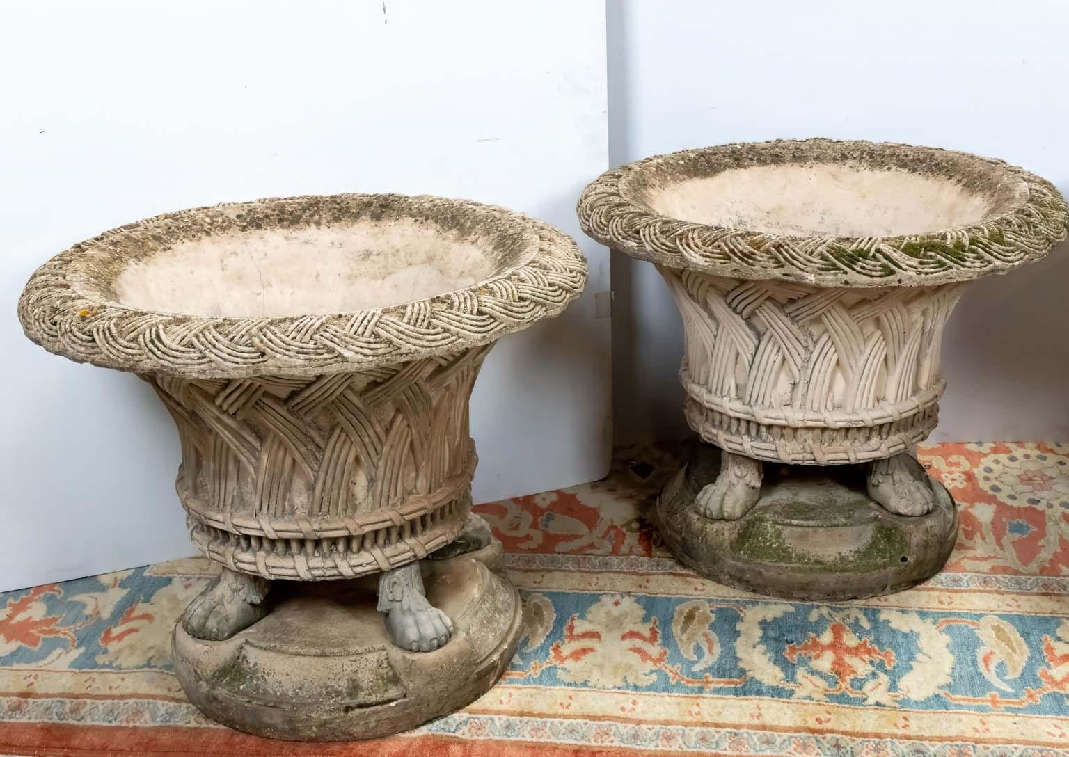 Pair of Stone Basket Weave Planters on Lions Feet In Fair Condition For Sale In Stamford, CT